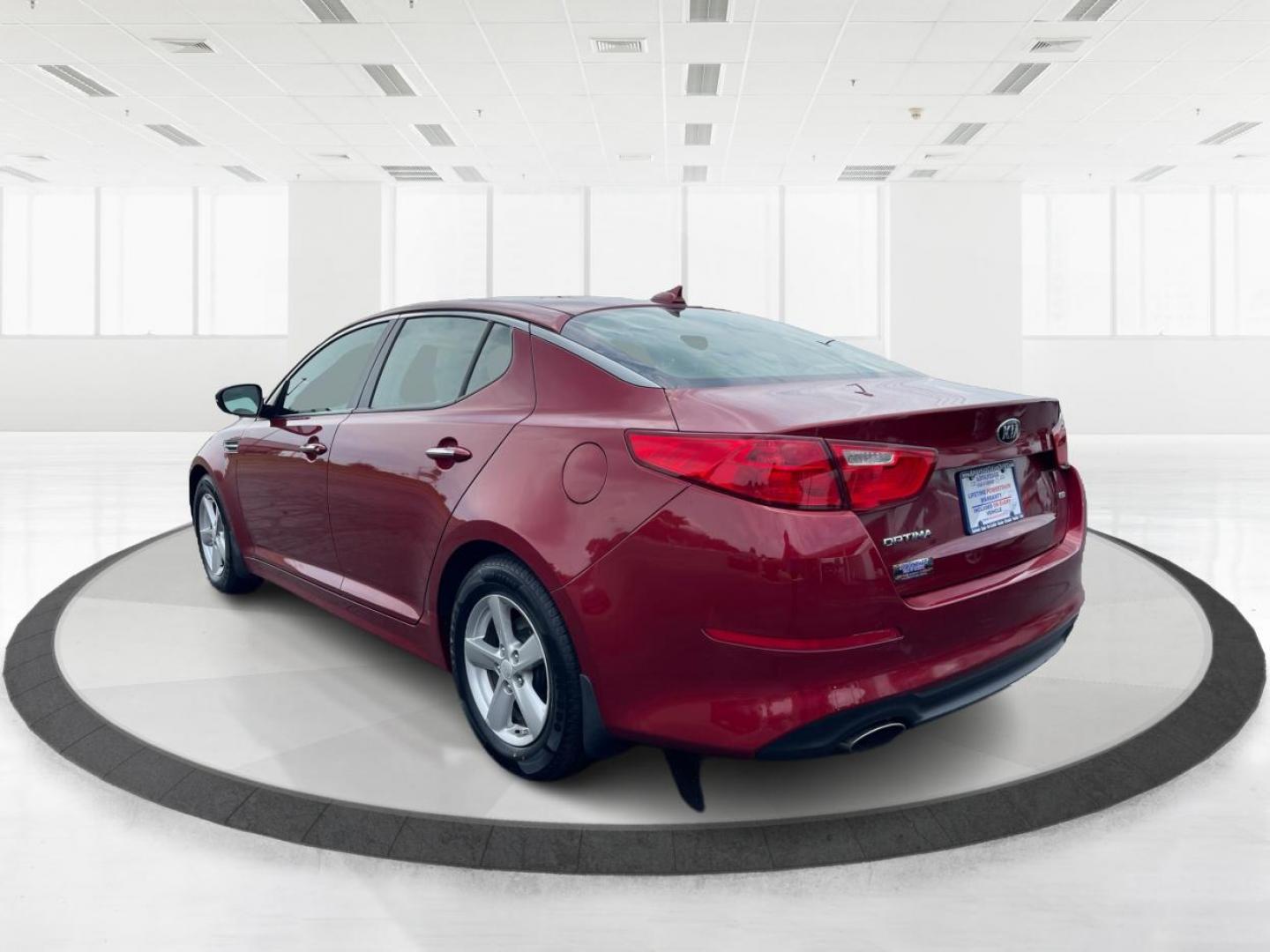 2015 Remington Red Metallic Kia Optima LX (5XXGM4A79FG) with an 2.4L L4 DOHC 16V engine, 6-Speed Automatic transmission, located at 4508 South Dixie Dr, Moraine, OH, 45439, (937) 908-9800, 39.689976, -84.218452 - Photo#4