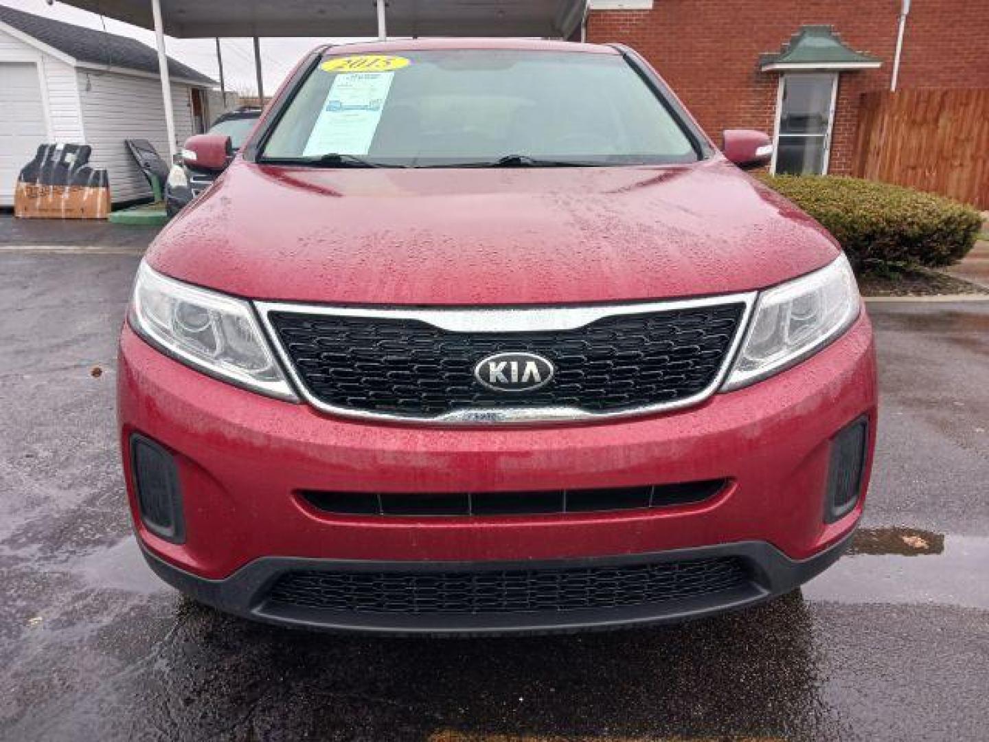 2015 Remington Red Metallic Kia Sorento LX AWD (5XYKTCA66FG) with an 2.4L L4 DOHC 16V engine, 6-Speed Automatic transmission, located at 1230 East Main St, Xenia, OH, 45385, (937) 908-9800, 39.688026, -83.910172 - Photo#1