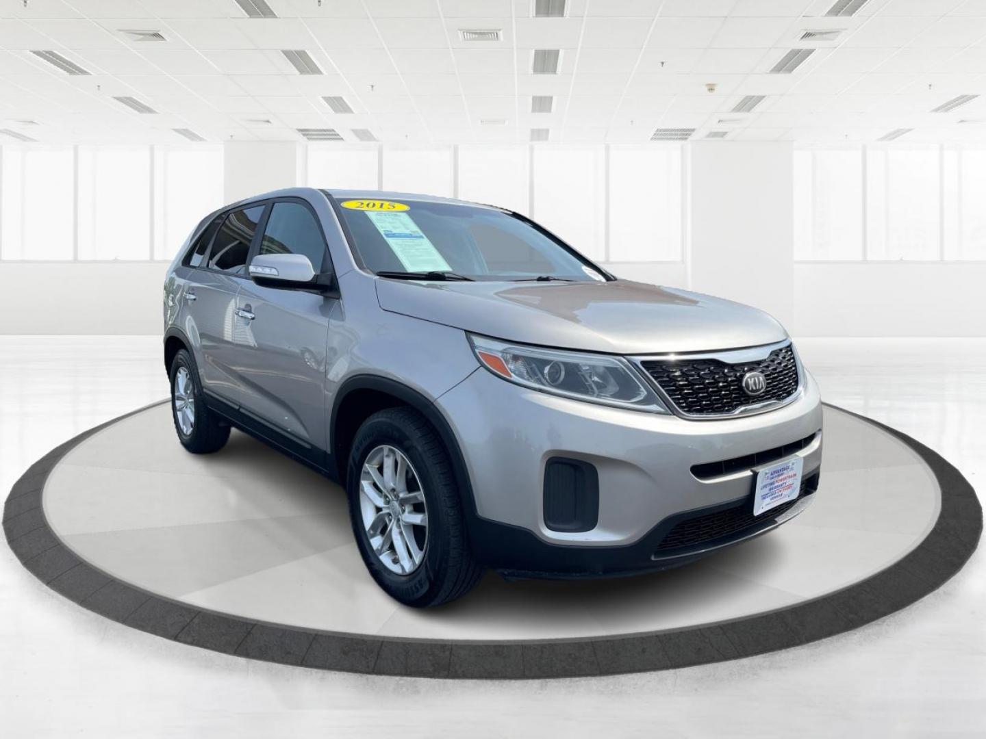 2015 Bright Silver Kia Sorento (5XYKT3A64FG) with an 2.4L L4 DOHC 16V engine, 6-Speed Automatic transmission, located at 1099 N County Rd 25A, Troy, OH, 45373, (937) 908-9800, 40.057079, -84.212883 - Photo#0