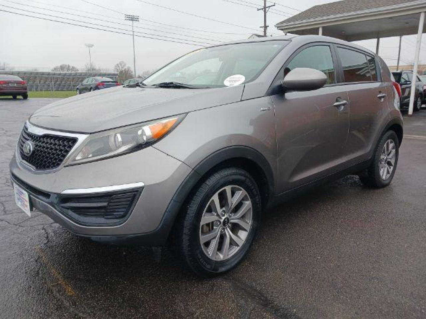 2015 Mineral Silver Kia Sportage LX AWD (KNDPBCAC7F7) with an 2.4L V6 DOHC 24V engine, 6-Speed Automatic transmission, located at 4508 South Dixie Dr, Moraine, OH, 45439, (937) 908-9800, 39.689976, -84.218452 - Photo#2