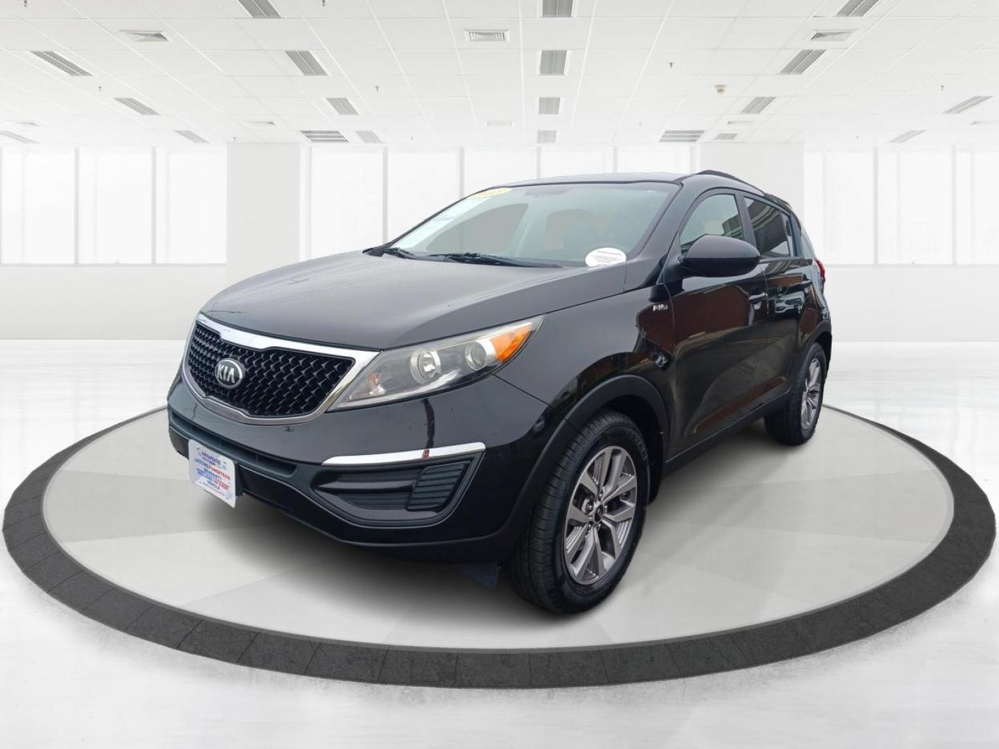 2015 Black Cherry Kia Sportage LX AWD (KNDPBCAC2F7) with an 2.4L V6 DOHC 24V engine, 6-Speed Automatic transmission, located at 401 Woodman Dr, Riverside, OH, 45431, (937) 908-9800, 39.760899, -84.123421 - Photo#7