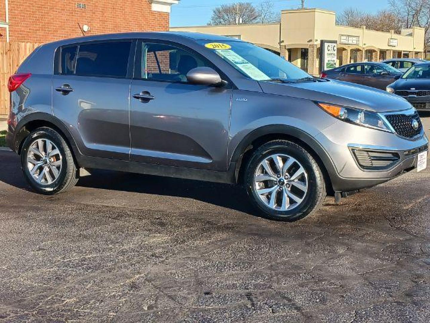 2015 Sand Track Kia Sportage LX AWD (KNDPBCACXF7) with an 2.4L V6 DOHC 24V engine, 6-Speed Automatic transmission, located at 1951 S Dayton Lakeview Rd., New Carlisle, OH, 45344, (937) 908-9800, 39.890999, -84.050255 - Photo#0