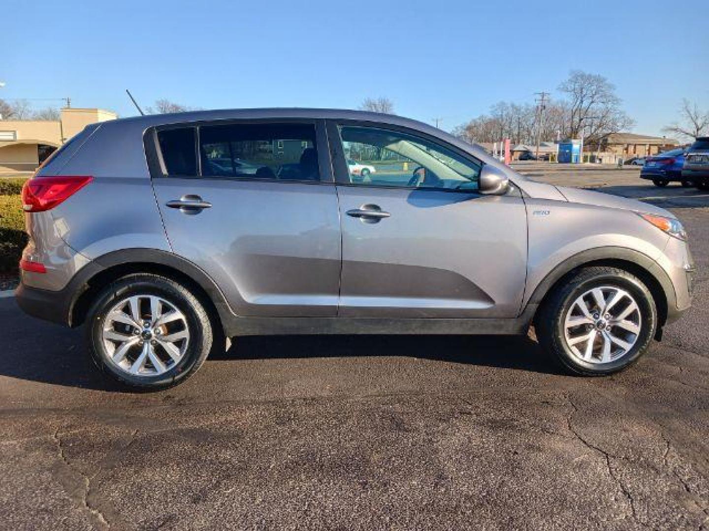 2015 Sand Track Kia Sportage LX AWD (KNDPBCACXF7) with an 2.4L V6 DOHC 24V engine, 6-Speed Automatic transmission, located at 1951 S Dayton Lakeview Rd., New Carlisle, OH, 45344, (937) 908-9800, 39.890999, -84.050255 - Photo#4