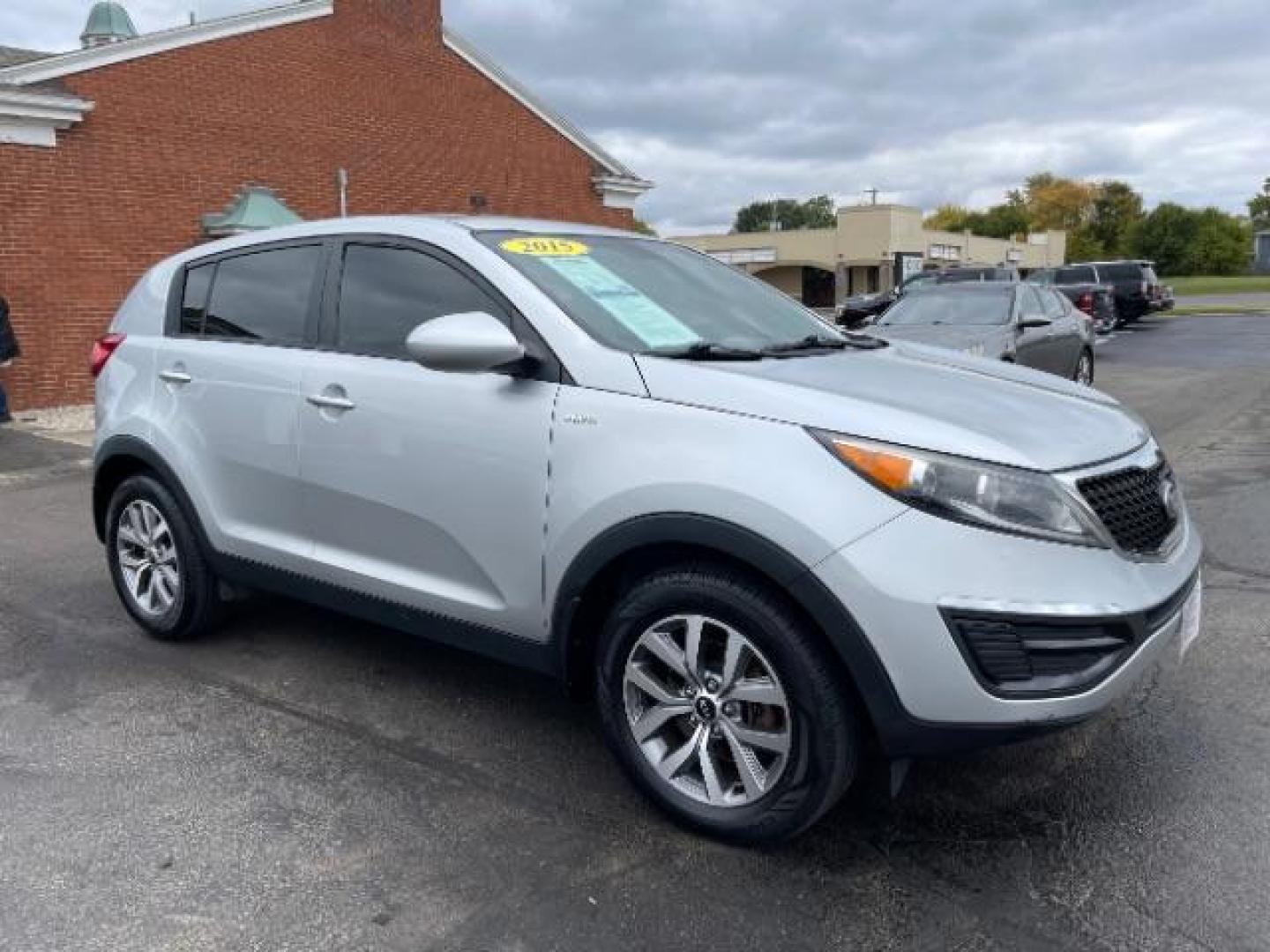 2015 Bright Silver Kia Sportage LX AWD (KNDPBCAC8F7) with an 2.4L V6 DOHC 24V engine, 6-Speed Automatic transmission, located at 401 Woodman Dr, Riverside, OH, 45431, (937) 908-9800, 39.760899, -84.123421 - Photo#0