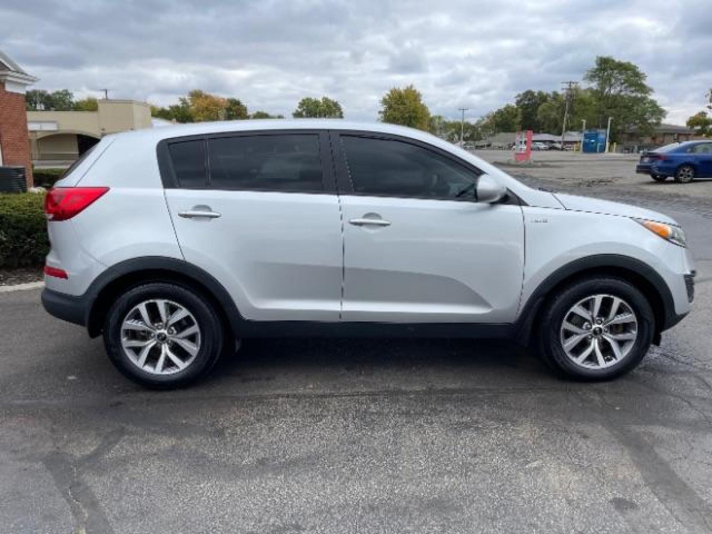 2015 Bright Silver Kia Sportage LX AWD (KNDPBCAC8F7) with an 2.4L V6 DOHC 24V engine, 6-Speed Automatic transmission, located at 401 Woodman Dr, Riverside, OH, 45431, (937) 908-9800, 39.760899, -84.123421 - Photo#3