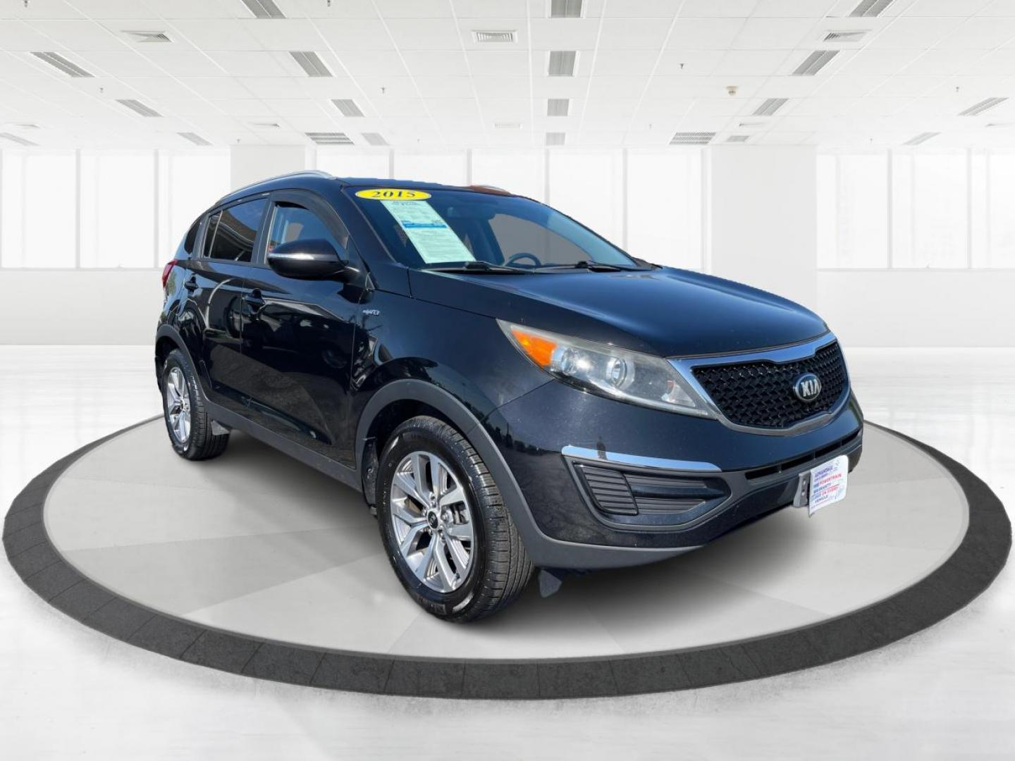 2015 Black Kia Sportage LX AWD (KNDPBCAC9F7) with an 2.4L V6 DOHC 24V engine, 6-Speed Automatic transmission, located at 1230 East Main St, Xenia, OH, 45385, (937) 908-9800, 39.688026, -83.910172 - Photo#0