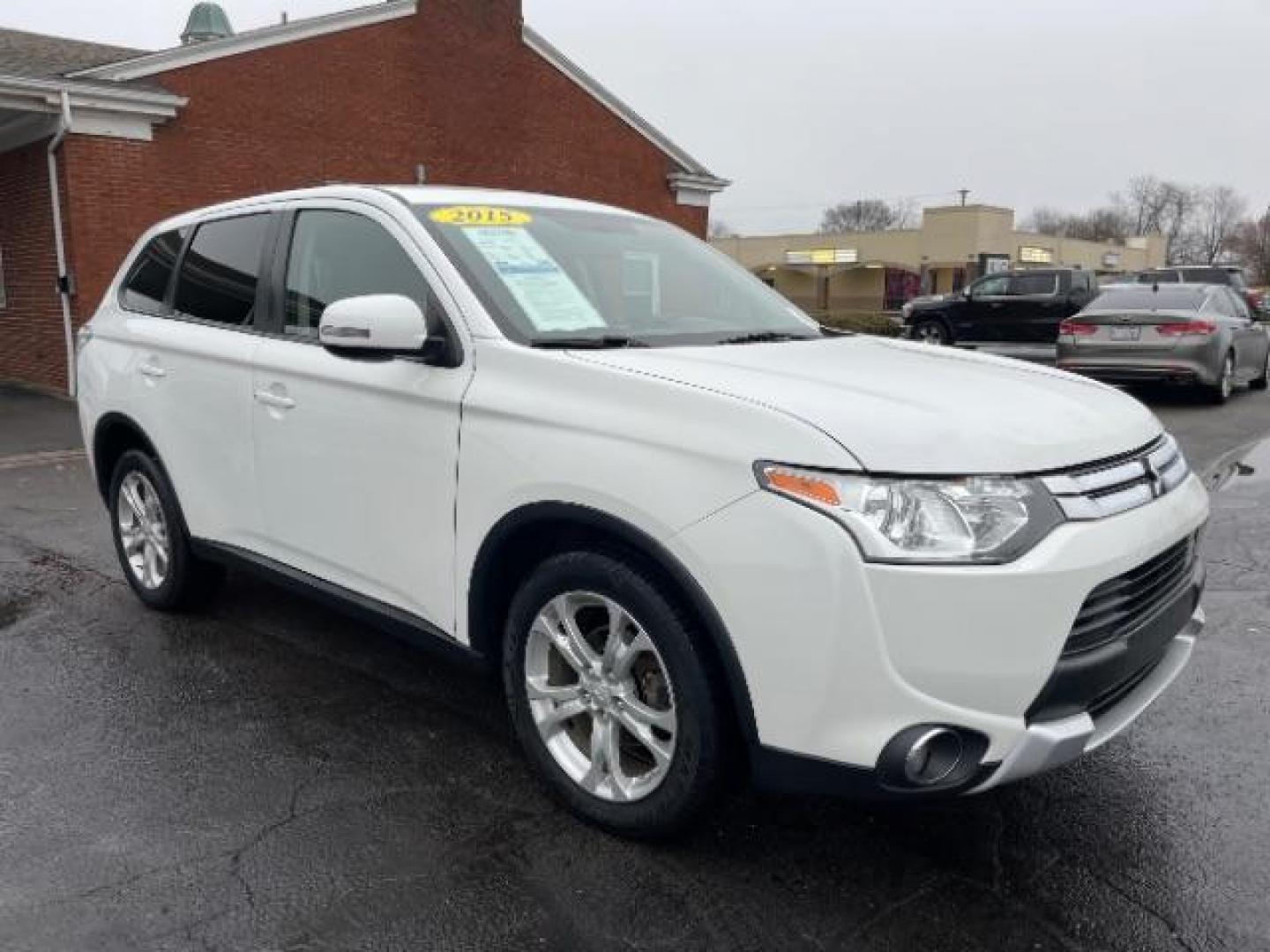 2015 Diamond White Mitsubishi Outlander SE S-AWC (JA4AZ3A33FZ) with an 2.4L L4 DOHC 16V engine, 6-Speed Automatic transmission, located at 1099 N County Rd 25A, Troy, OH, 45373, (937) 908-9800, 40.057079, -84.212883 - Photo#0