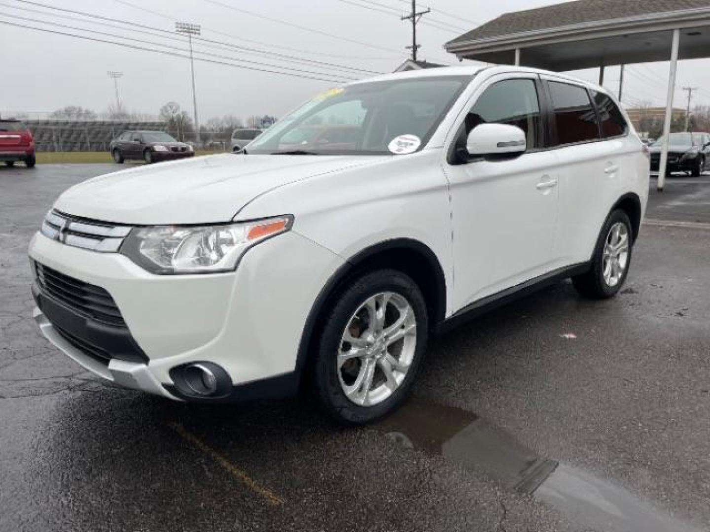 2015 Diamond White Mitsubishi Outlander SE S-AWC (JA4AZ3A33FZ) with an 2.4L L4 DOHC 16V engine, 6-Speed Automatic transmission, located at 1099 N County Rd 25A, Troy, OH, 45373, (937) 908-9800, 40.057079, -84.212883 - Photo#1