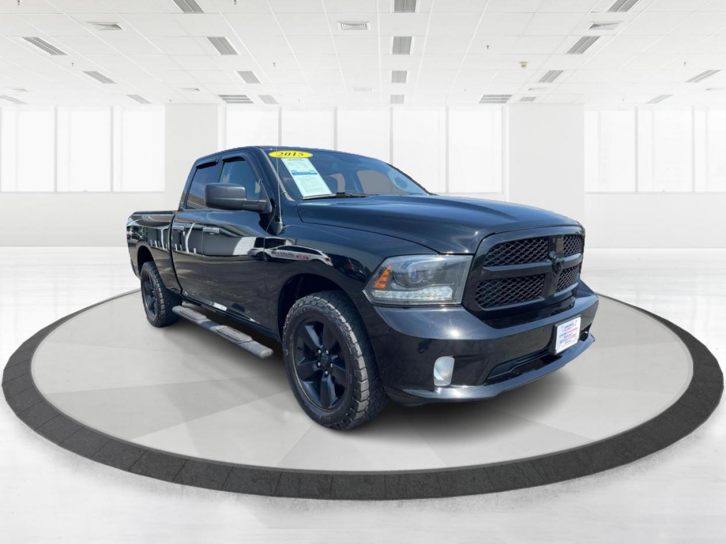 2015 Black RAM 1500 Tradesman Quad Cab 4WD (1C6RR7FTXFS) with an 5.7L V8 OHV 16V engine, 8-Speed Automatic transmission, located at 1184 Kauffman Ave, Fairborn, OH, 45324, (937) 908-9800, 39.807072, -84.030914 - Photo#0