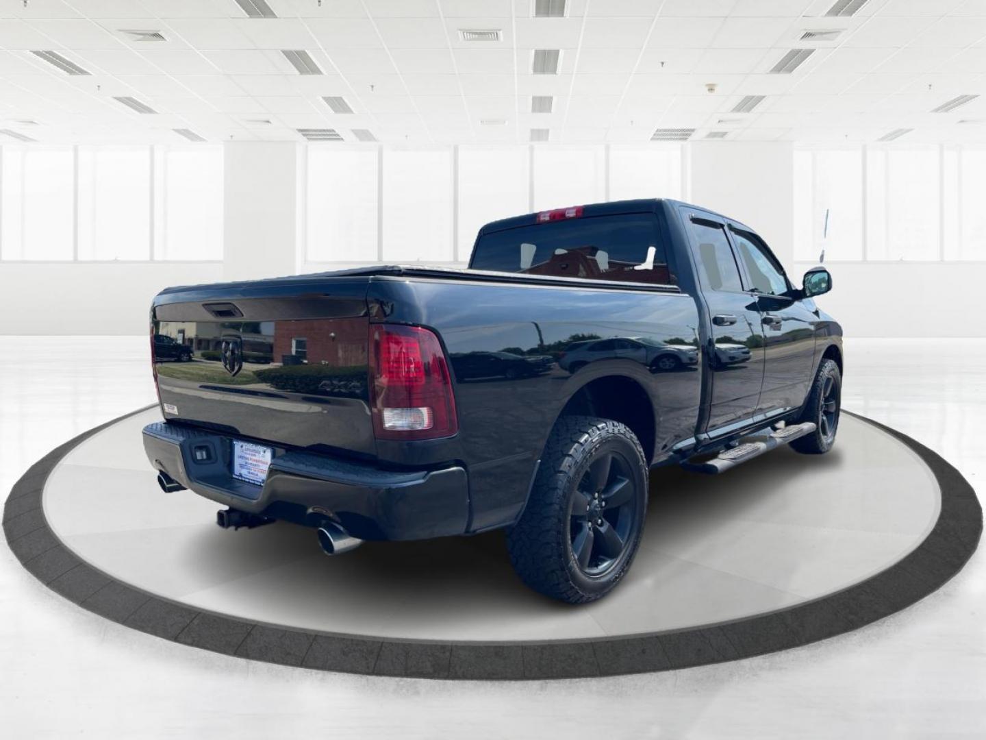 2015 Black RAM 1500 Tradesman Quad Cab 4WD (1C6RR7FTXFS) with an 5.7L V8 OHV 16V engine, 8-Speed Automatic transmission, located at 1184 Kauffman Ave, Fairborn, OH, 45324, (937) 908-9800, 39.807072, -84.030914 - Photo#2