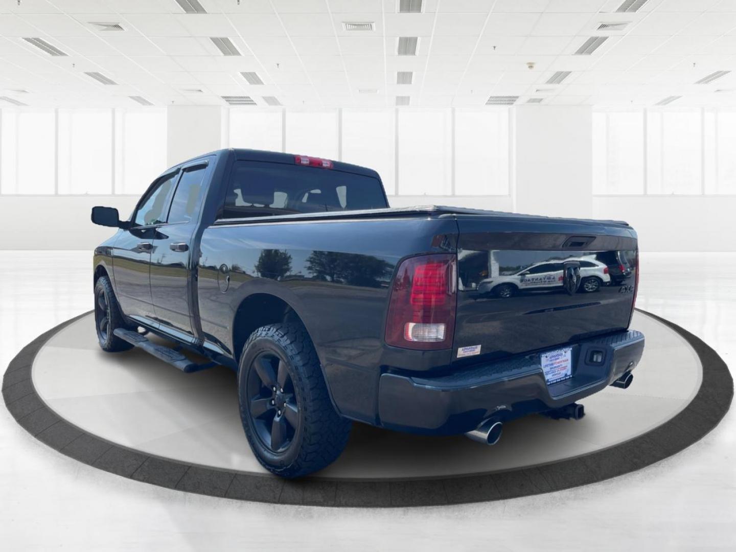 2015 Black RAM 1500 Tradesman Quad Cab 4WD (1C6RR7FTXFS) with an 5.7L V8 OHV 16V engine, 8-Speed Automatic transmission, located at 1184 Kauffman Ave, Fairborn, OH, 45324, (937) 908-9800, 39.807072, -84.030914 - Photo#4