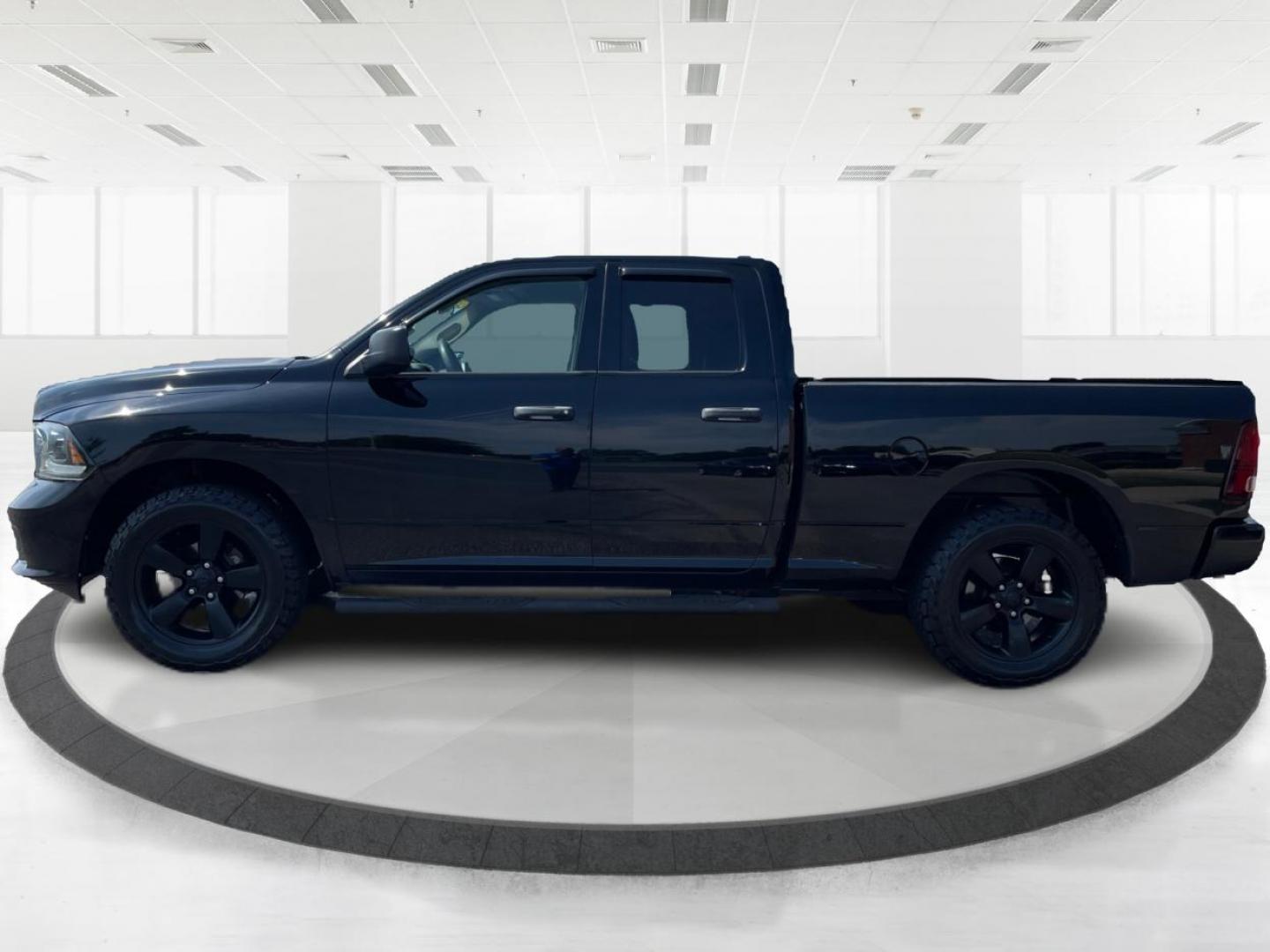 2015 Black RAM 1500 Tradesman Quad Cab 4WD (1C6RR7FTXFS) with an 5.7L V8 OHV 16V engine, 8-Speed Automatic transmission, located at 1184 Kauffman Ave, Fairborn, OH, 45324, (937) 908-9800, 39.807072, -84.030914 - Photo#5