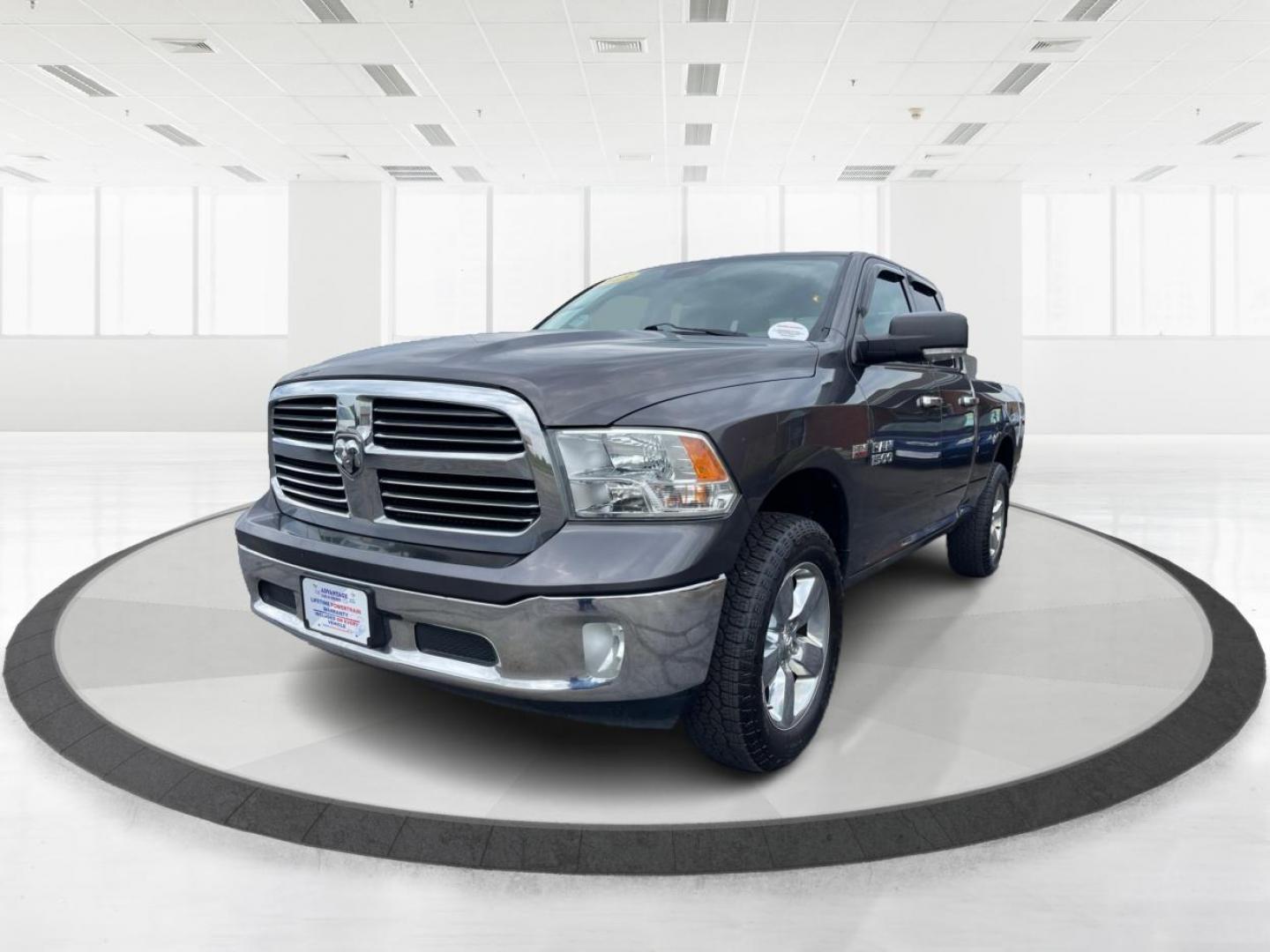 2015 Gray RAM 1500 SLT Quad Cab 4WD (1C6RR7GT3FS) with an 5.7L V8 OHV 16V engine, 8-Speed Automatic transmission, located at 1951 S Dayton Lakeview Rd., New Carlisle, OH, 45344, (937) 908-9800, 39.890999, -84.050255 - Photo#7