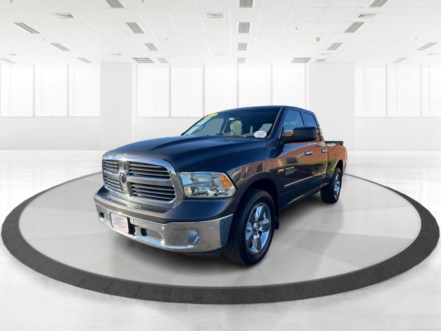 2015 Gray RAM 1500 SLT Quad Cab 4WD (1C6RR7GT2FS) with an 5.7L V8 OHV 16V engine, 6-Speed Automatic transmission, located at 401 Woodman Dr, Riverside, OH, 45431, (937) 908-9800, 39.760899, -84.123421 - Photo#7