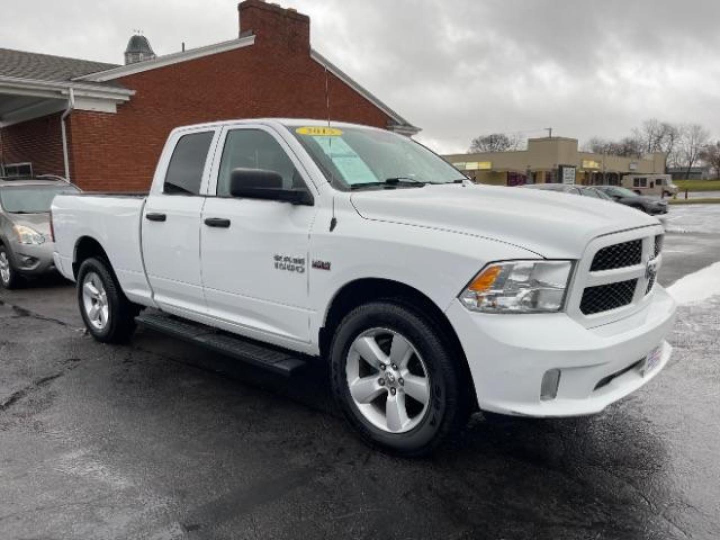 2015 White RAM 1500 Tradesman Quad Cab 4WD (1C6RR7FTXFS) with an 5.7L V8 OHV 16V engine, 8-Speed Automatic transmission, located at 1184 Kauffman Ave, Fairborn, OH, 45324, (937) 908-9800, 39.807072, -84.030914 - Photo#0