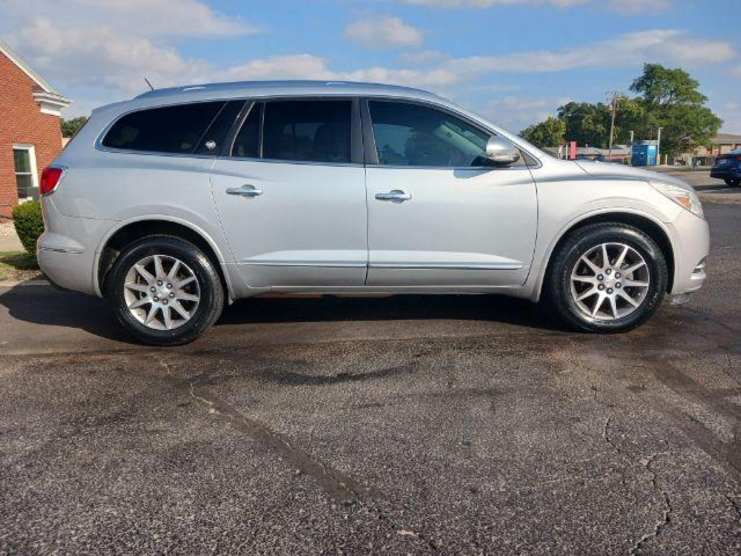 2016 Sparkling Silver Metallic Buick Enclave Leather FWD (5GAKRBKDXGJ) with an 3.6L V6 DOHC 24V engine, 6-Speed Automatic Overdrive transmission, located at 1099 N County Rd 25A, Troy, OH, 45373, (937) 908-9800, 40.057079, -84.212883 - Photo#4