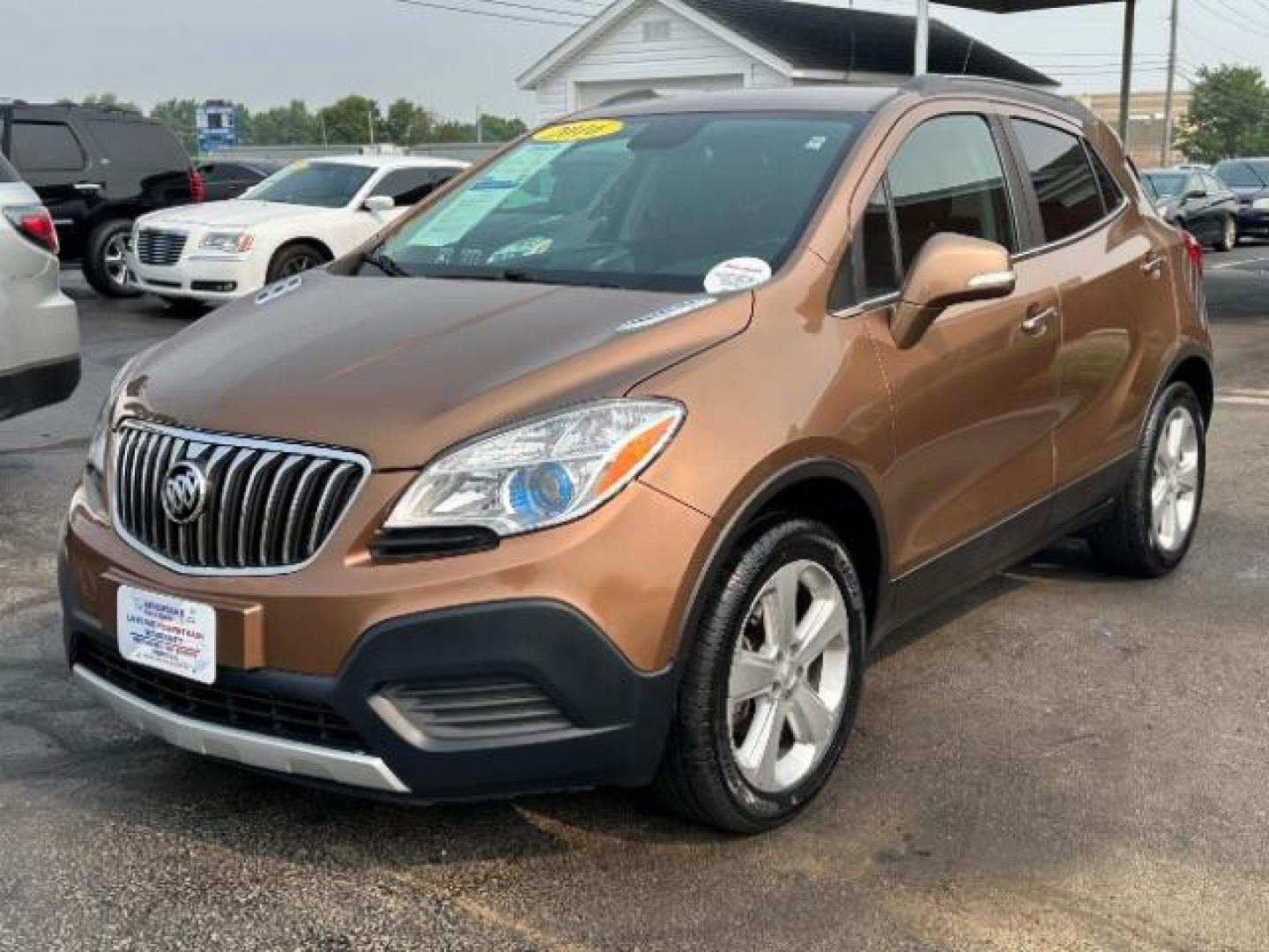 2016 River Rock Metallic/Dark Cocoa Ash Buick Encore Base FWD (KL4CJASB3GB) with an 1.4L L4 DOHC 16V TURBO engine, 6-Speed Automatic transmission, located at 401 Woodman Dr, Riverside, OH, 45431, (937) 908-9800, 39.760899, -84.123421 - Photo#2