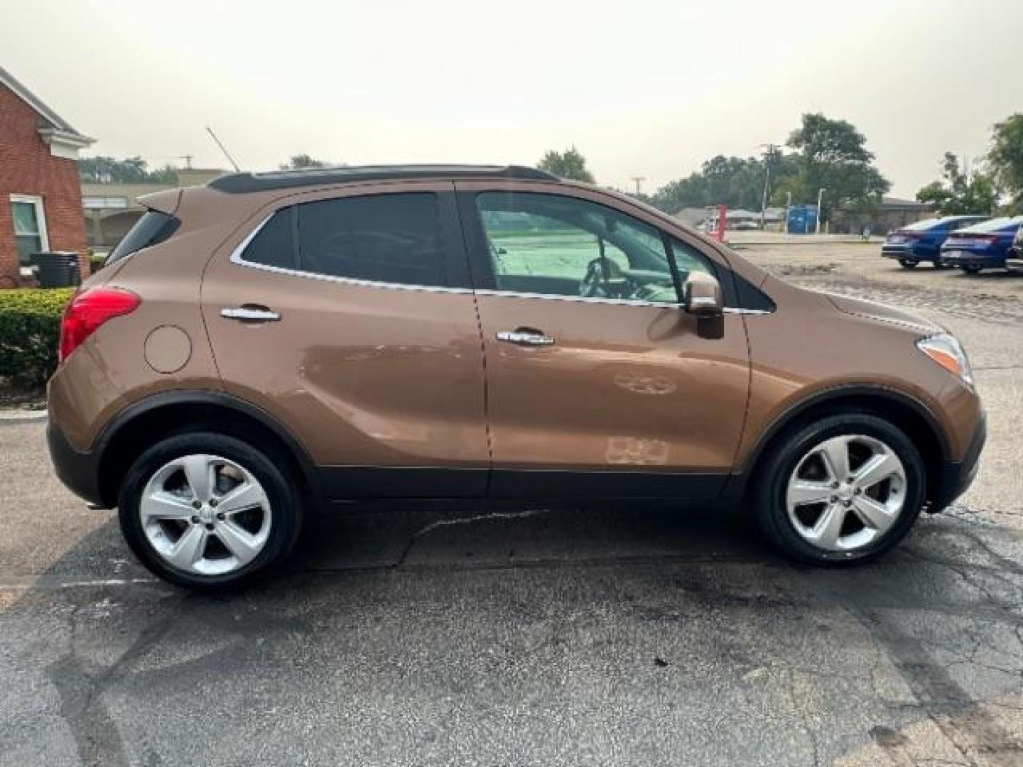 2016 River Rock Metallic/Dark Cocoa Ash Buick Encore Base FWD (KL4CJASB3GB) with an 1.4L L4 DOHC 16V TURBO engine, 6-Speed Automatic transmission, located at 401 Woodman Dr, Riverside, OH, 45431, (937) 908-9800, 39.760899, -84.123421 - Photo#4