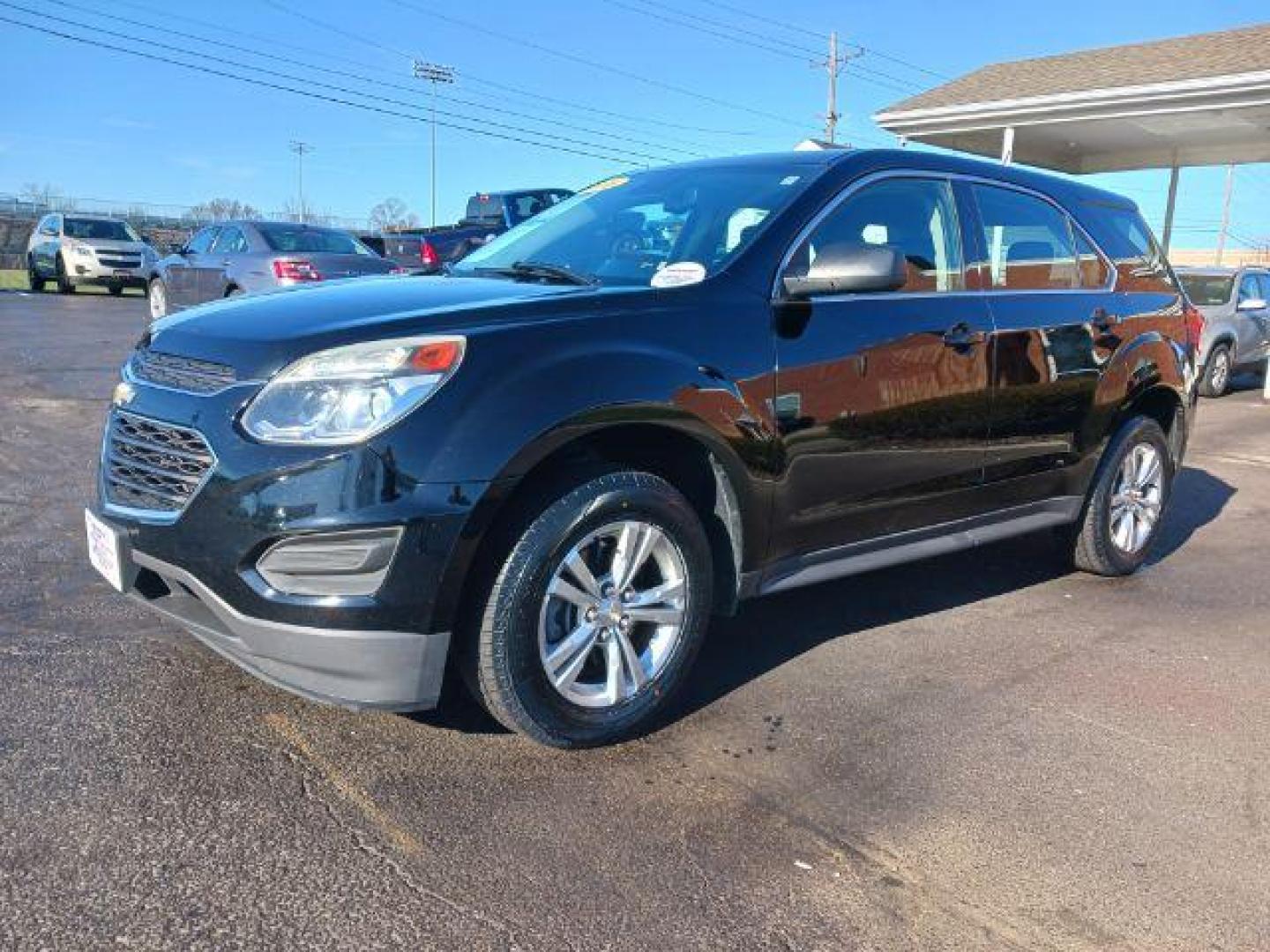 2016 Black Chevrolet Equinox LS 2WD (2GNALBEK0G6) with an 2.4L L4 DOHC 16V FFV engine, 6-Speed Automatic transmission, located at 401 Woodman Dr, Riverside, OH, 45431, (937) 908-9800, 39.760899, -84.123421 - Photo#2