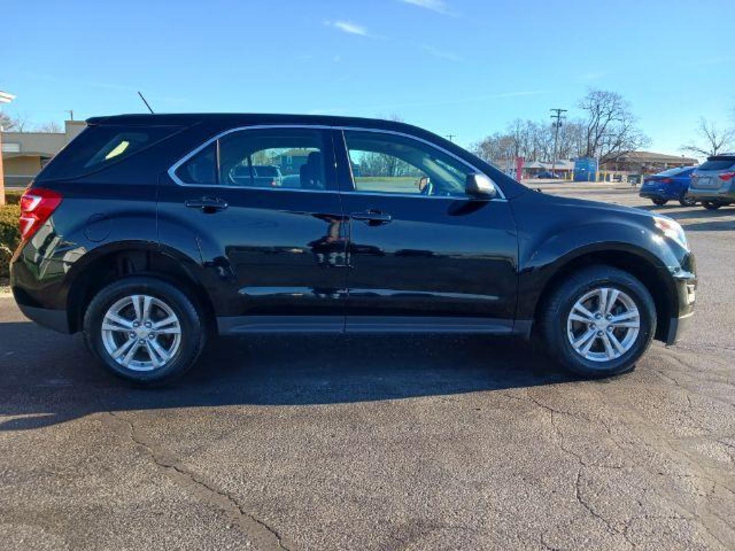 2016 Black Chevrolet Equinox LS 2WD (2GNALBEK0G6) with an 2.4L L4 DOHC 16V FFV engine, 6-Speed Automatic transmission, located at 401 Woodman Dr, Riverside, OH, 45431, (937) 908-9800, 39.760899, -84.123421 - Photo#4