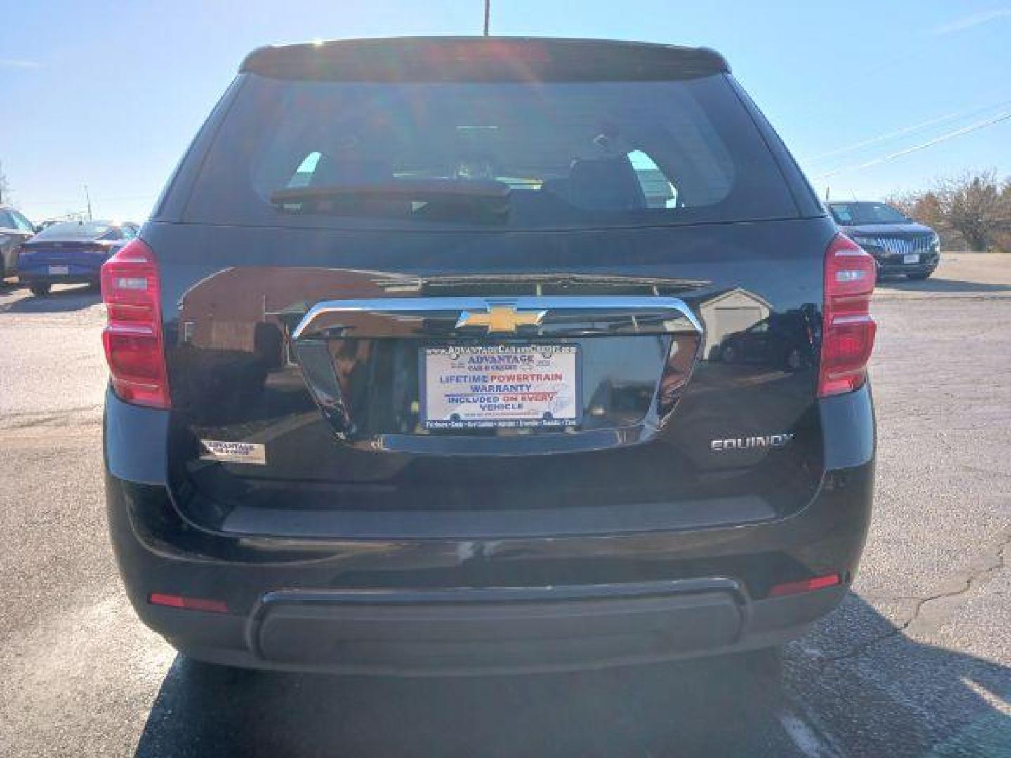 2016 Black Chevrolet Equinox LS 2WD (2GNALBEK0G6) with an 2.4L L4 DOHC 16V FFV engine, 6-Speed Automatic transmission, located at 401 Woodman Dr, Riverside, OH, 45431, (937) 908-9800, 39.760899, -84.123421 - Photo#5