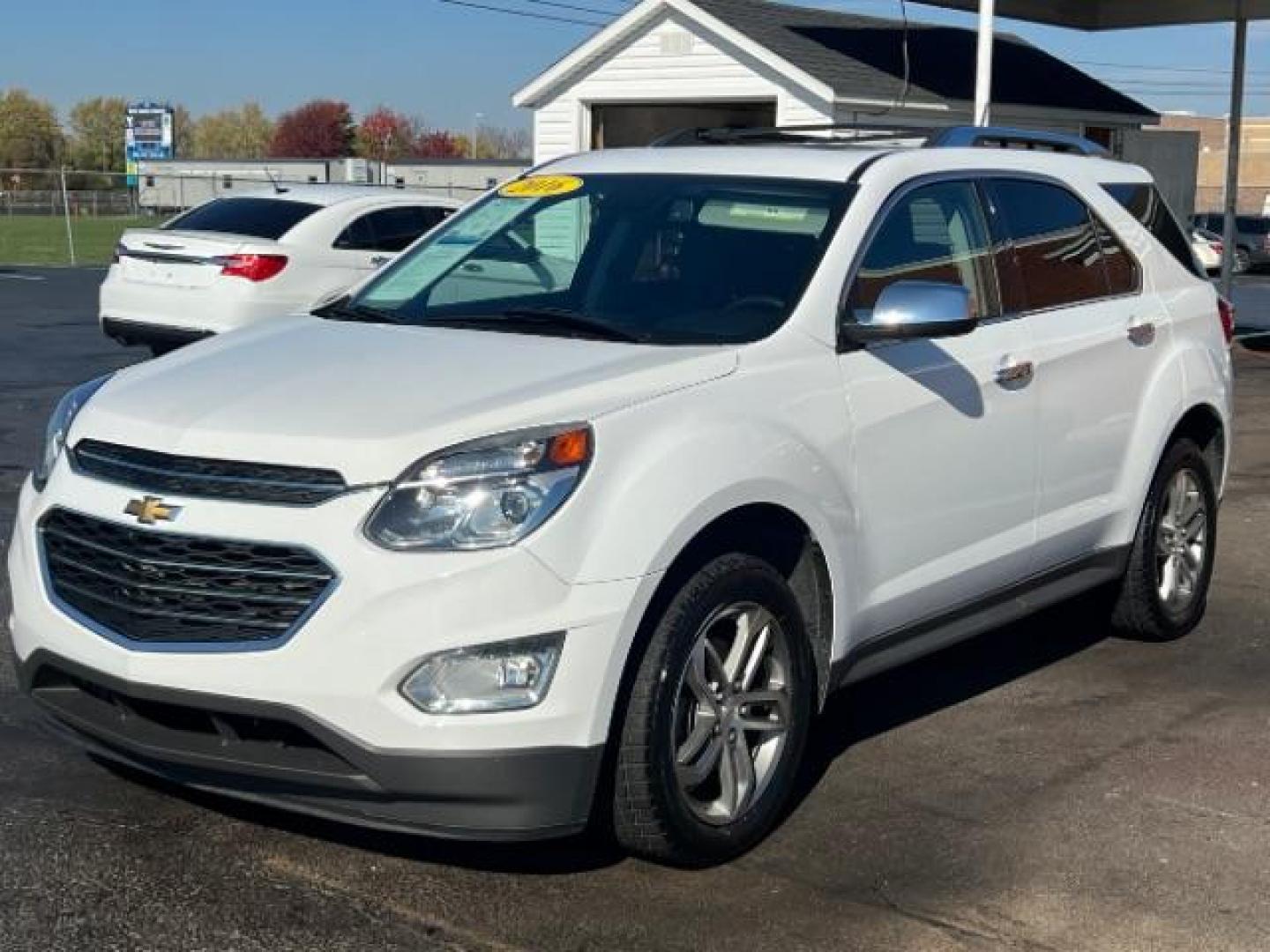 2016 Summit White Chevrolet Equinox LTZ 2WD (1GNALDEK4GZ) with an 2.4L L4 DOHC 16V FFV engine, 6-Speed Automatic transmission, located at 1951 S Dayton Lakeview Rd., New Carlisle, OH, 45344, (937) 908-9800, 39.890999, -84.050255 - Photo#2