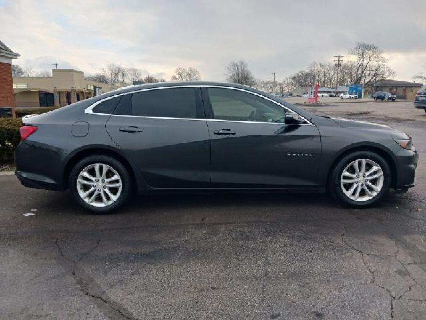 2016 Mosaic Black Metallic Chevrolet Malibu 1LT (1G1ZE5ST7GF) with an 1.5L L4 DOHC 16V engine, 6-Speed Automatic transmission, located at 880 E. National Road, Vandalia, OH, 45377, (937) 908-9800, 39.891918, -84.183594 - Photo#4