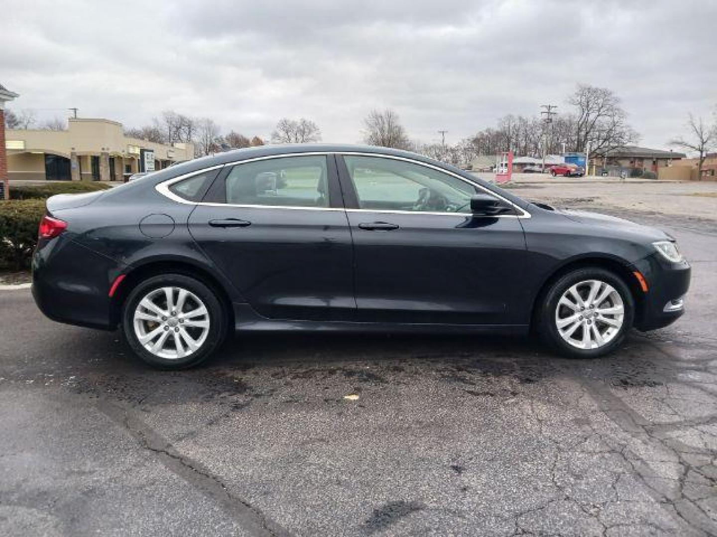 2016 Maximum Steel Metallic Clear Coat Chrysler 200 Limited (1C3CCCABXGN) with an 2.4L L4 DOHC 16V engine, 9-Speed Automatic transmission, located at 4508 South Dixie Dr, Moraine, OH, 45439, (937) 908-9800, 39.689976, -84.218452 - Photo#4