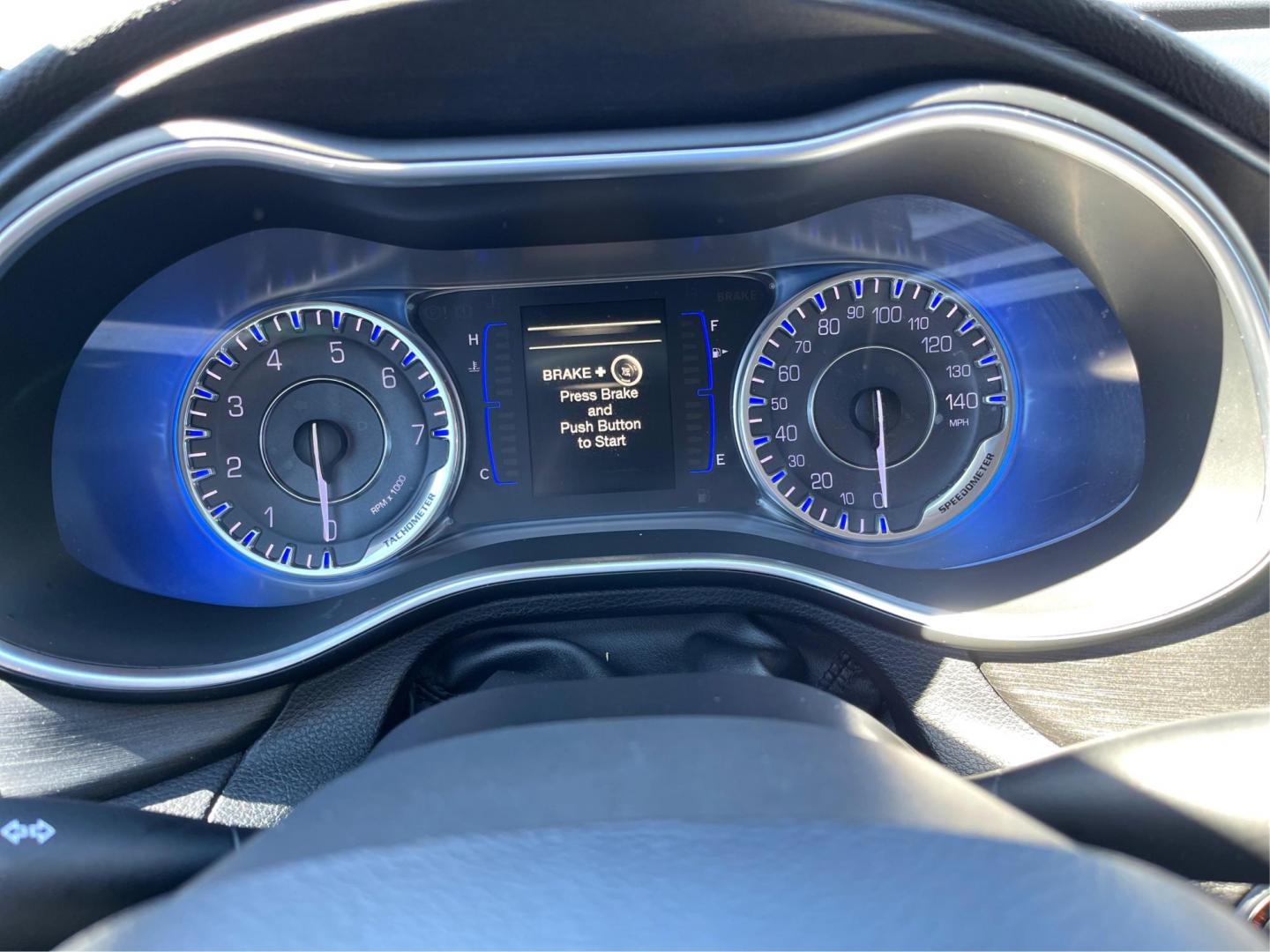 2016 Vivid Blue Pearl Coat Chrysler 200 Limited (1C3CCCAB2GN) with an 2.4L L4 DOHC 16V engine, 9-Speed Automatic transmission, located at 880 E. National Road, Vandalia, OH, 45377, (937) 908-9800, 39.891918, -84.183594 - Photo#13