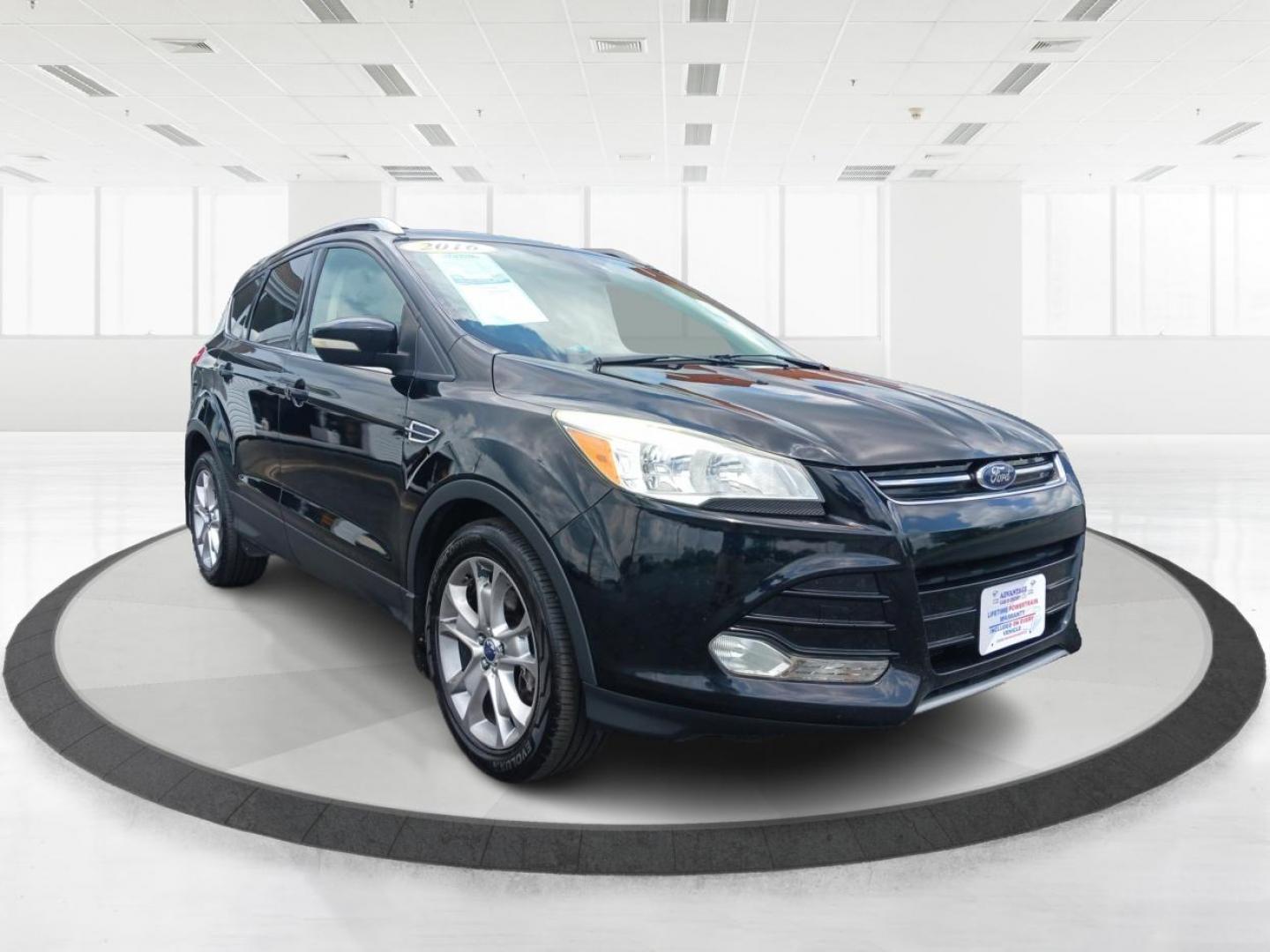 2016 Shadow Black Ford Escape (1FMCU9J9XGU) with an 2.0L L4 DOHC 16V engine, 6-Speed Automatic transmission, located at 1184 Kauffman Ave, Fairborn, OH, 45324, (937) 908-9800, 39.807072, -84.030914 - Photo#0