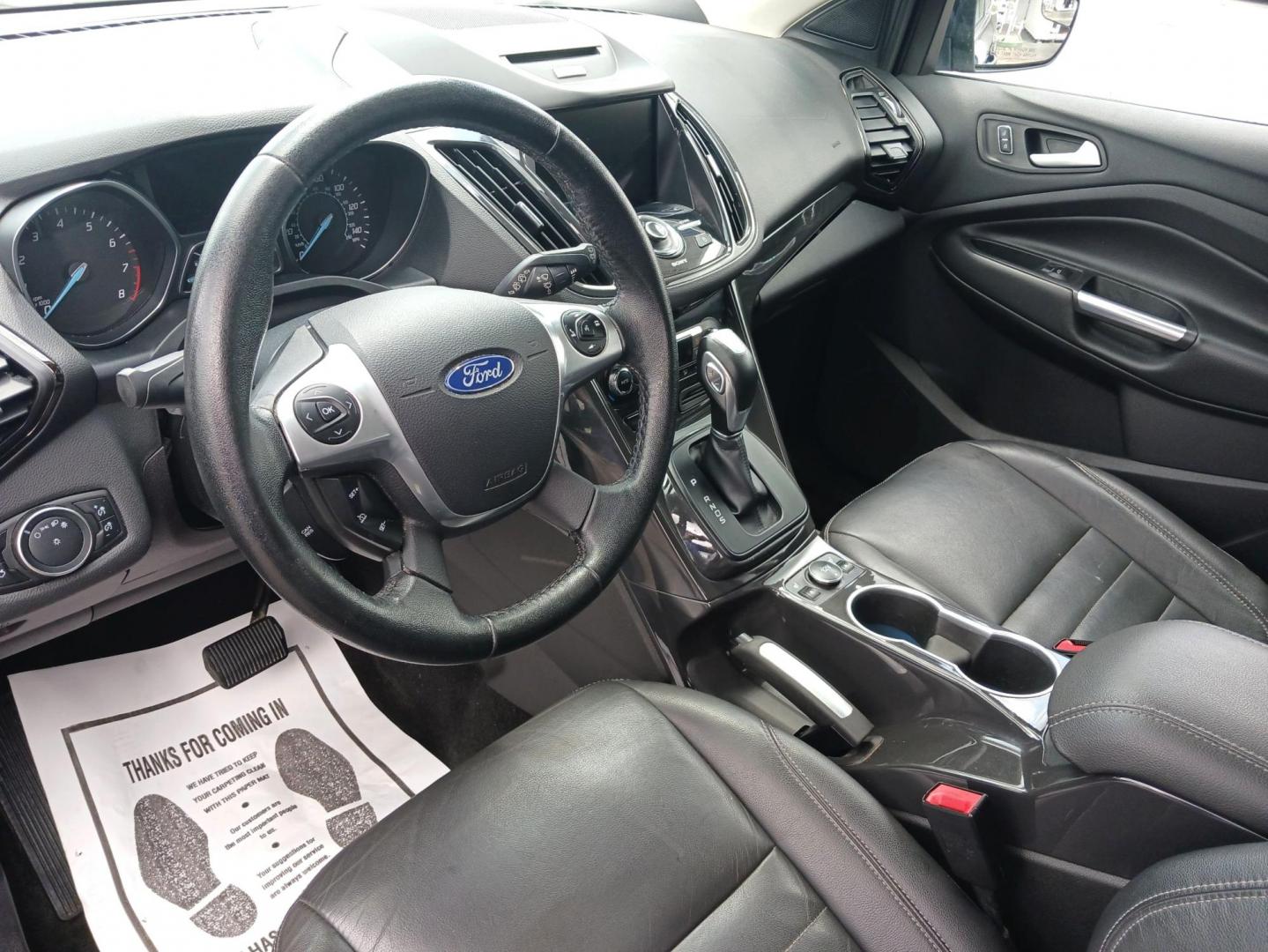 2016 Shadow Black Ford Escape (1FMCU9J9XGU) with an 2.0L L4 DOHC 16V engine, 6-Speed Automatic transmission, located at 1184 Kauffman Ave, Fairborn, OH, 45324, (937) 908-9800, 39.807072, -84.030914 - Photo#8