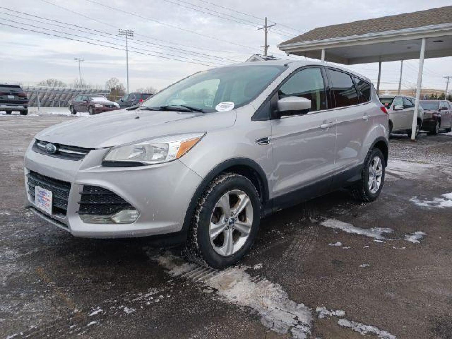 2016 Ingot Silver Metallic Ford Escape SE 4WD (1FMCU9G96GU) with an 2.0L L4 DOHC 16V engine, 6-Speed Automatic transmission, located at 880 E. National Road, Vandalia, OH, 45377, (937) 908-9800, 39.891918, -84.183594 - Photo#2