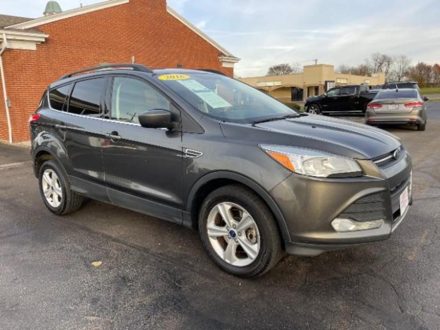 2016 Magnetic Metallic Ford Escape SE 4WD (1FMCU9G99GU) with an 2.0L L4 DOHC 16V engine, 6-Speed Automatic transmission, located at 1230 East Main St, Xenia, OH, 45385, (937) 908-9800, 39.688026, -83.910172 - Photo#0