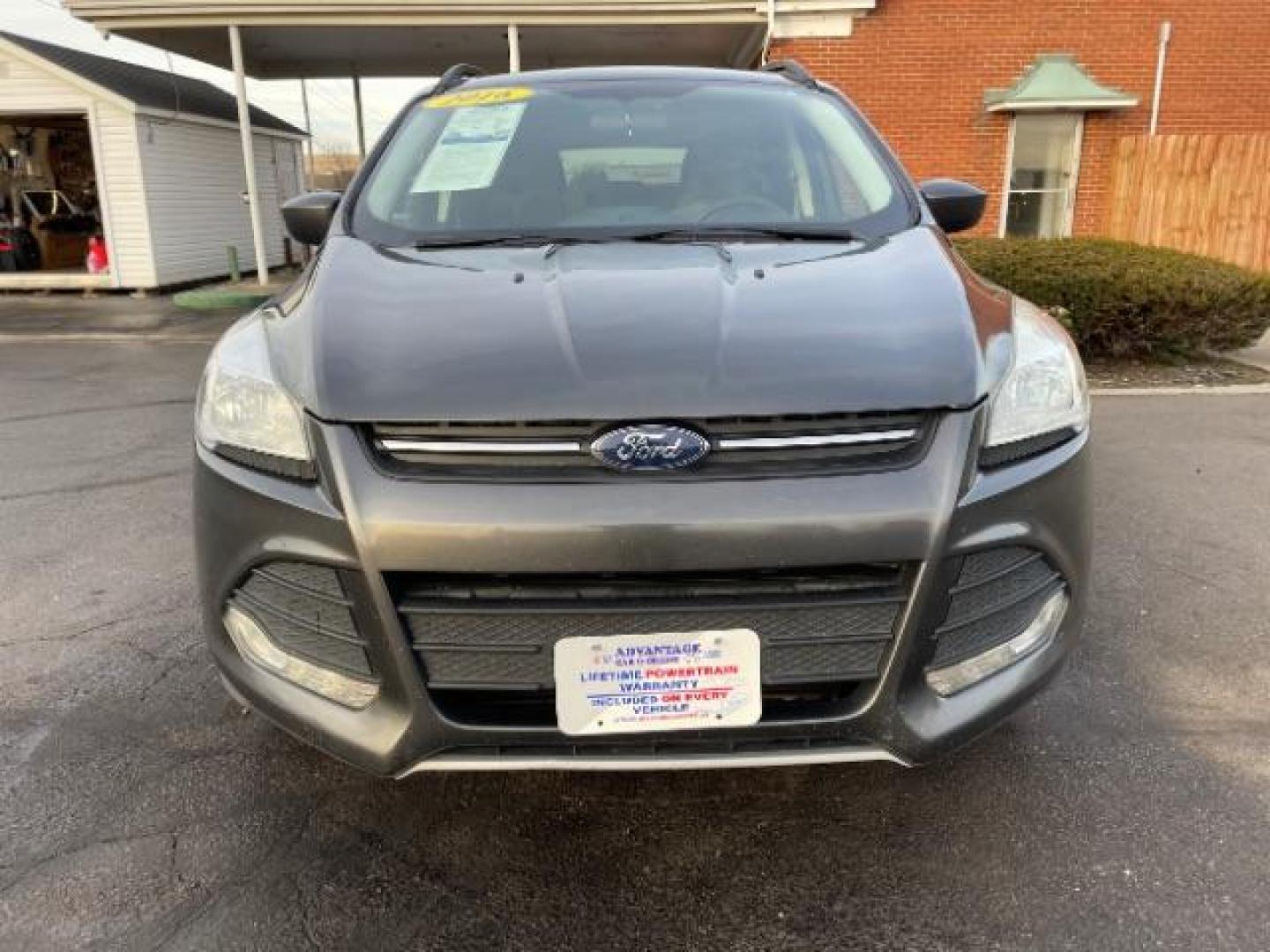 2016 Magnetic Metallic Ford Escape SE 4WD (1FMCU9G99GU) with an 2.0L L4 DOHC 16V engine, 6-Speed Automatic transmission, located at 1230 East Main St, Xenia, OH, 45385, (937) 908-9800, 39.688026, -83.910172 - Photo#5