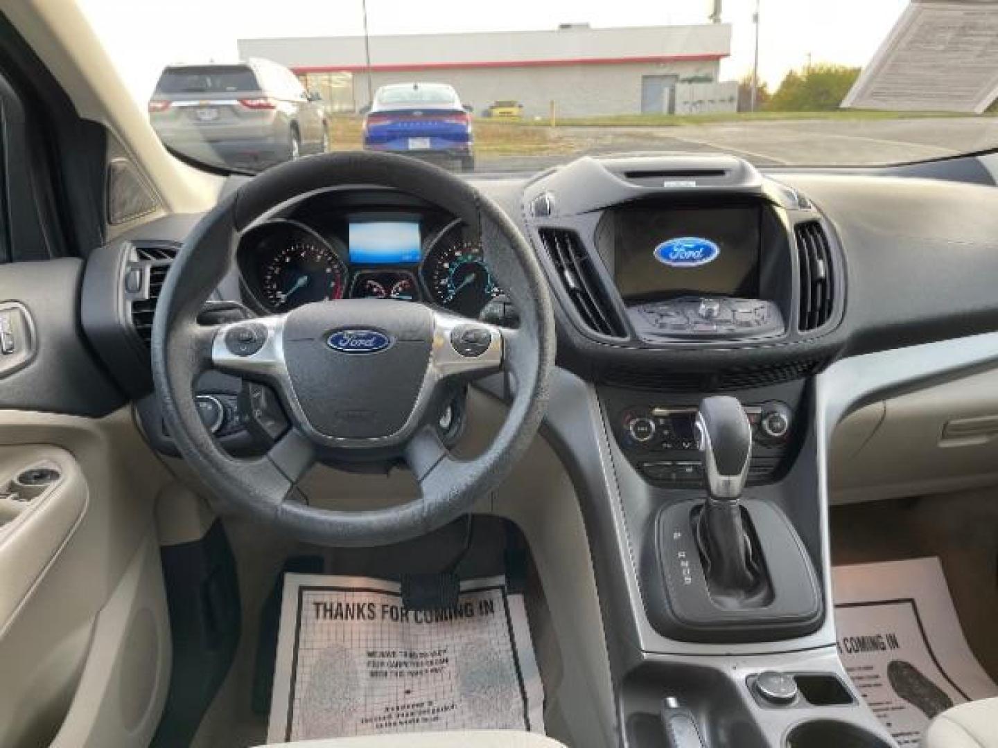 2016 Magnetic Metallic Ford Escape SE 4WD (1FMCU9G99GU) with an 2.0L L4 DOHC 16V engine, 6-Speed Automatic transmission, located at 1230 East Main St, Xenia, OH, 45385, (937) 908-9800, 39.688026, -83.910172 - Photo#7