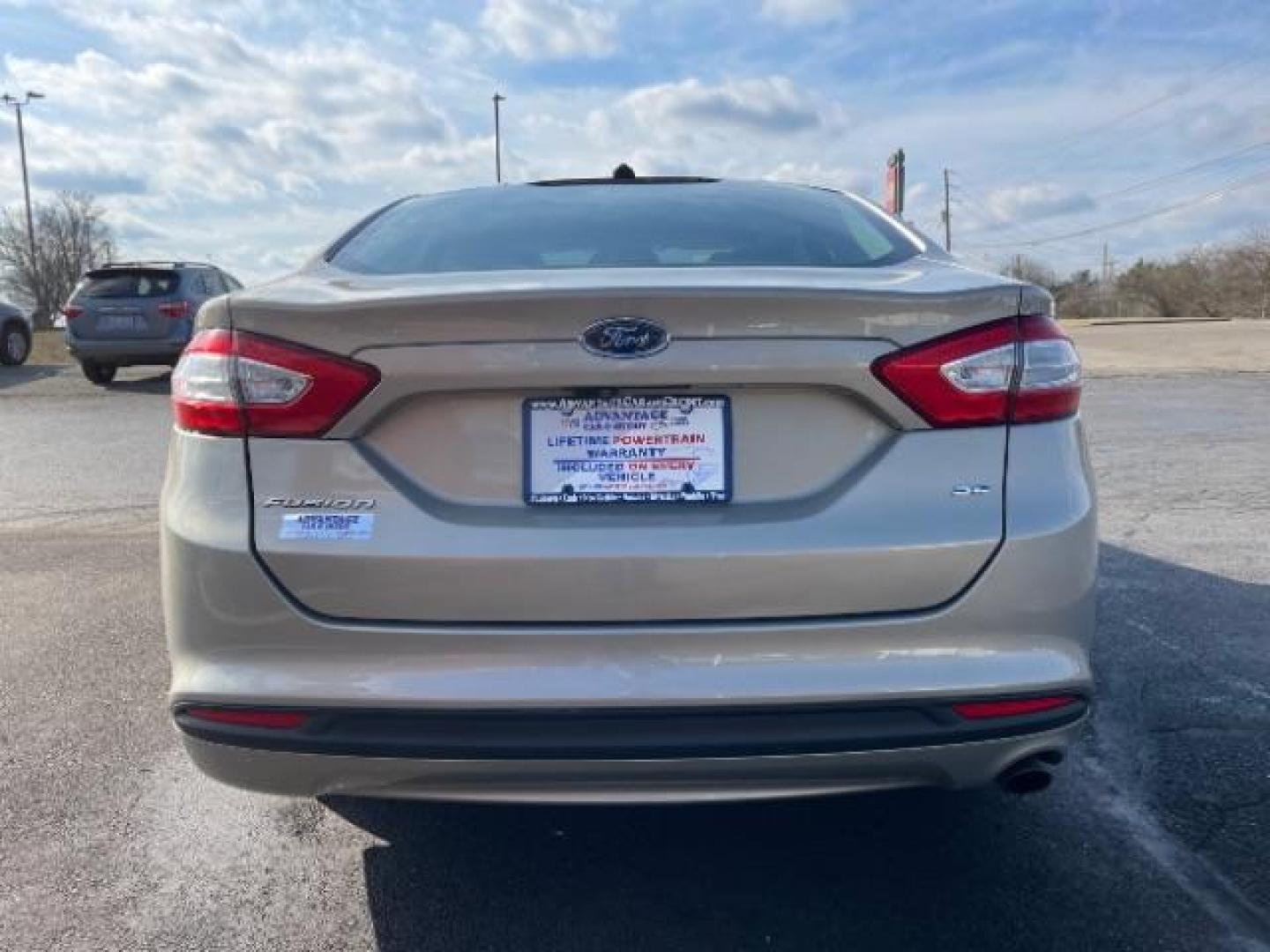 2016 Brown Ford Fusion SE (3FA6P0H70GR) with an 2.5L L4 DOHC 16V engine, 6-Speed Automatic transmission, located at 1184 Kauffman Ave, Fairborn, OH, 45324, (937) 908-9800, 39.807072, -84.030914 - Photo#5