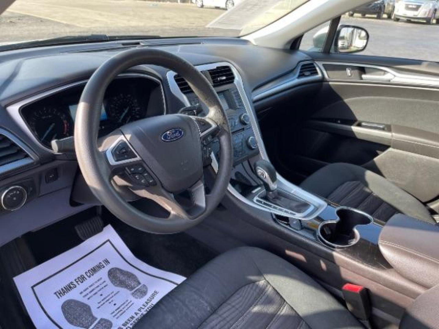 2016 Brown Ford Fusion SE (3FA6P0H70GR) with an 2.5L L4 DOHC 16V engine, 6-Speed Automatic transmission, located at 1184 Kauffman Ave, Fairborn, OH, 45324, (937) 908-9800, 39.807072, -84.030914 - Photo#6