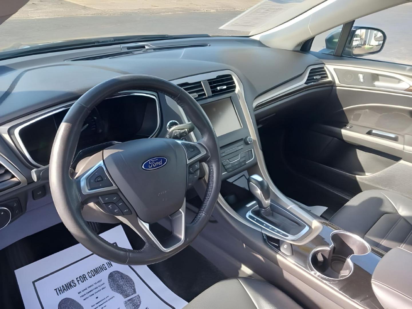 2016 Shadow Black Ford Fusion (3FA6P0T99GR) with an 2.0L L4 DOHC 16V engine, 6-Speed Automatic transmission, located at 1099 N County Rd 25A, Troy, OH, 45373, (937) 908-9800, 40.057079, -84.212883 - Photo#5