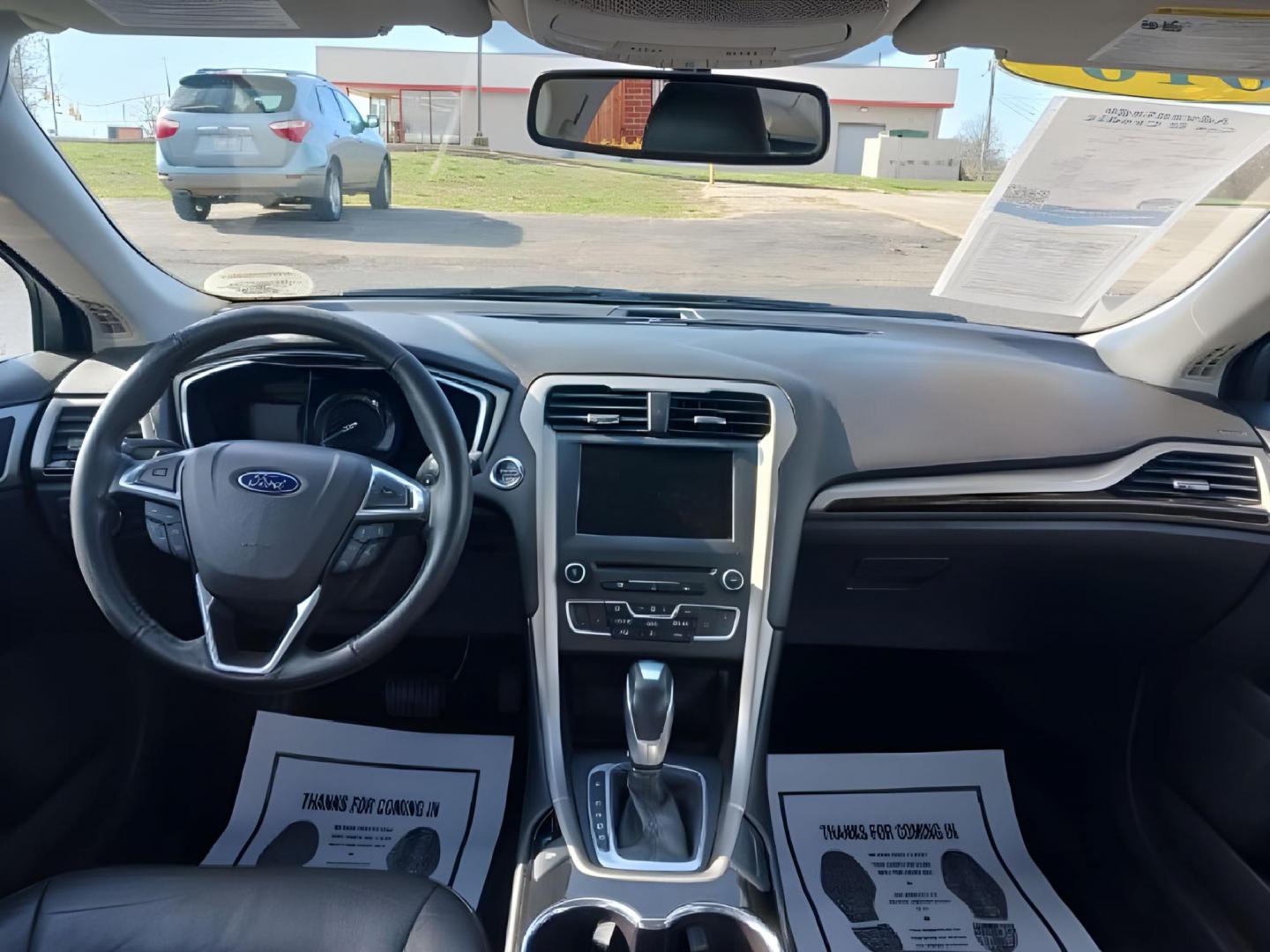 2016 Shadow Black Ford Fusion (3FA6P0T99GR) with an 2.0L L4 DOHC 16V engine, 6-Speed Automatic transmission, located at 1099 N County Rd 25A, Troy, OH, 45373, (937) 908-9800, 40.057079, -84.212883 - Photo#6