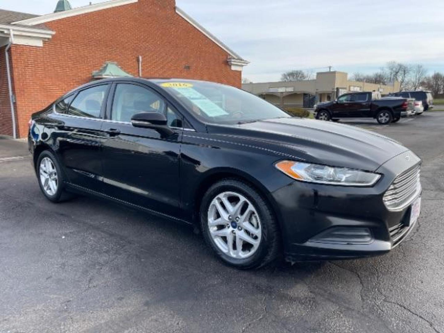 2016 Shadow Black Ford Fusion SE (3FA6P0H72GR) with an 2.5L L4 DOHC 16V engine, 6-Speed Automatic transmission, located at 1230 East Main St, Xenia, OH, 45385, (937) 908-9800, 39.688026, -83.910172 - Photo#0