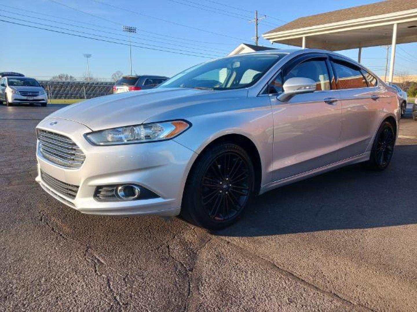 2016 Ingot Silver Metallic Ford Fusion SE (3FA6P0H99GR) with an 2.0L L4 DOHC 16V engine, 6-Speed Automatic transmission, located at 1230 East Main St, Xenia, OH, 45385, (937) 908-9800, 39.688026, -83.910172 - Photo#2