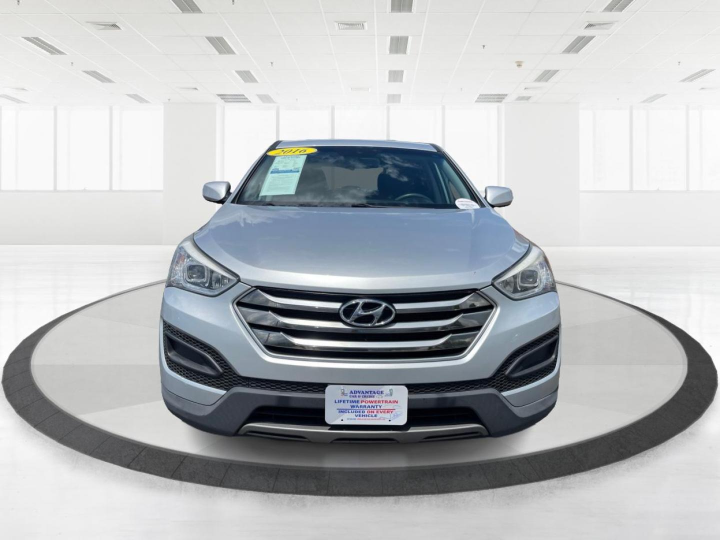 2016 Sparkling Silver Hyundai Santa Fe (5XYZTDLB8GG) with an 2.4L L4 DOHC 16V engine, 6-Speed Automatic transmission, located at 1184 Kauffman Ave, Fairborn, OH, 45324, (937) 908-9800, 39.807072, -84.030914 - Photo#6