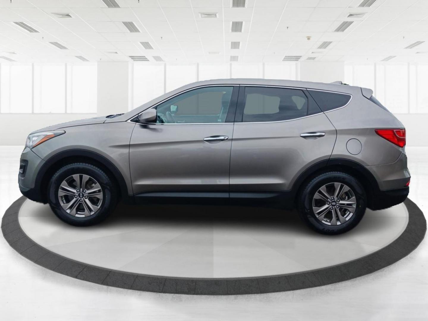 2016 Mineral Gray Hyundai Santa Fe (5XYZT3LB2GG) with an 2.4L L4 DOHC 16V engine, 6-Speed Automatic transmission, located at 401 Woodman Dr, Riverside, OH, 45431, (937) 908-9800, 39.760899, -84.123421 - Photo#5