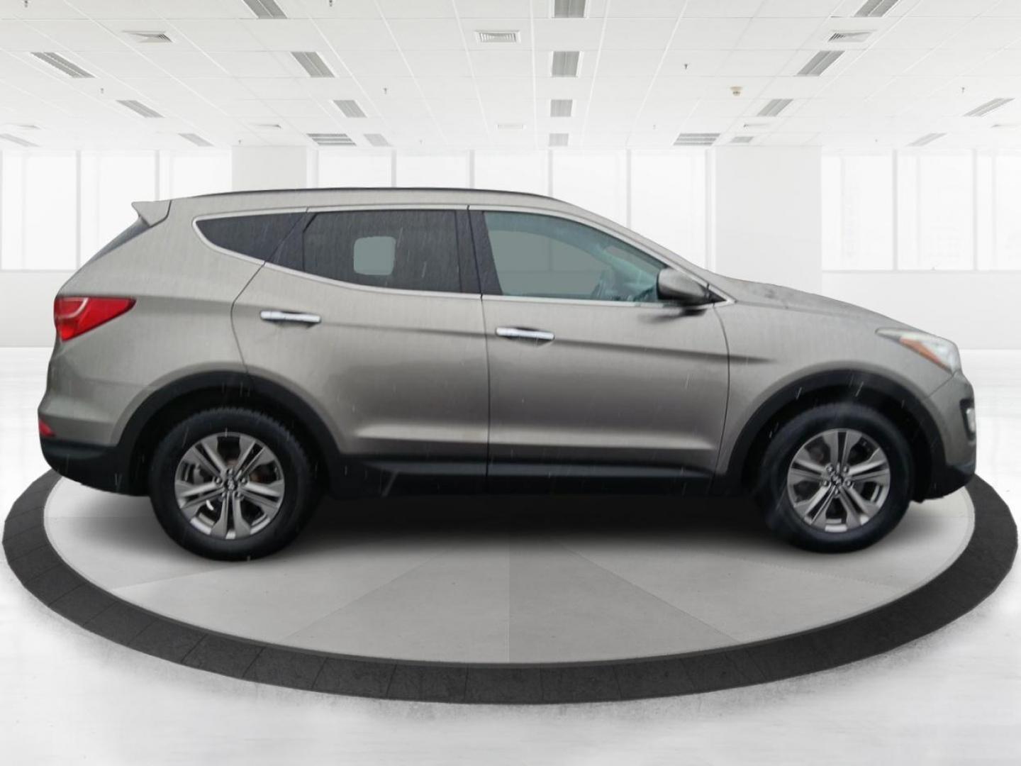 2016 Hyundai Santa Fe Sport 2.4 AWD (5XYZUDLB9GG) with an 2.4L L4 DOHC 16V engine, 6-Speed Automatic transmission, located at 1230 East Main St, Xenia, OH, 45385, (937) 908-9800, 39.688026, -83.910172 - 2016 Hyundai Santa Fe Sport 2.4 AWD - Photo#1