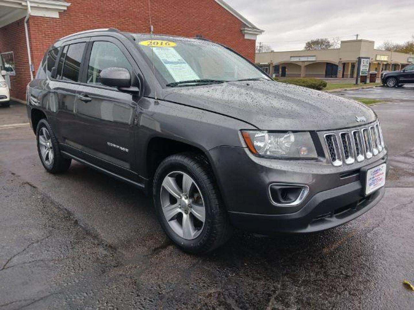 2016 Gray Jeep Compass Latitude 4WD (1C4NJDEB6GD) with an 2.4L L4 DOHC 16V engine, 6-Speed Automatic transmission, located at 4508 South Dixie Dr, Moraine, OH, 45439, (937) 908-9800, 39.689976, -84.218452 - Photo#0