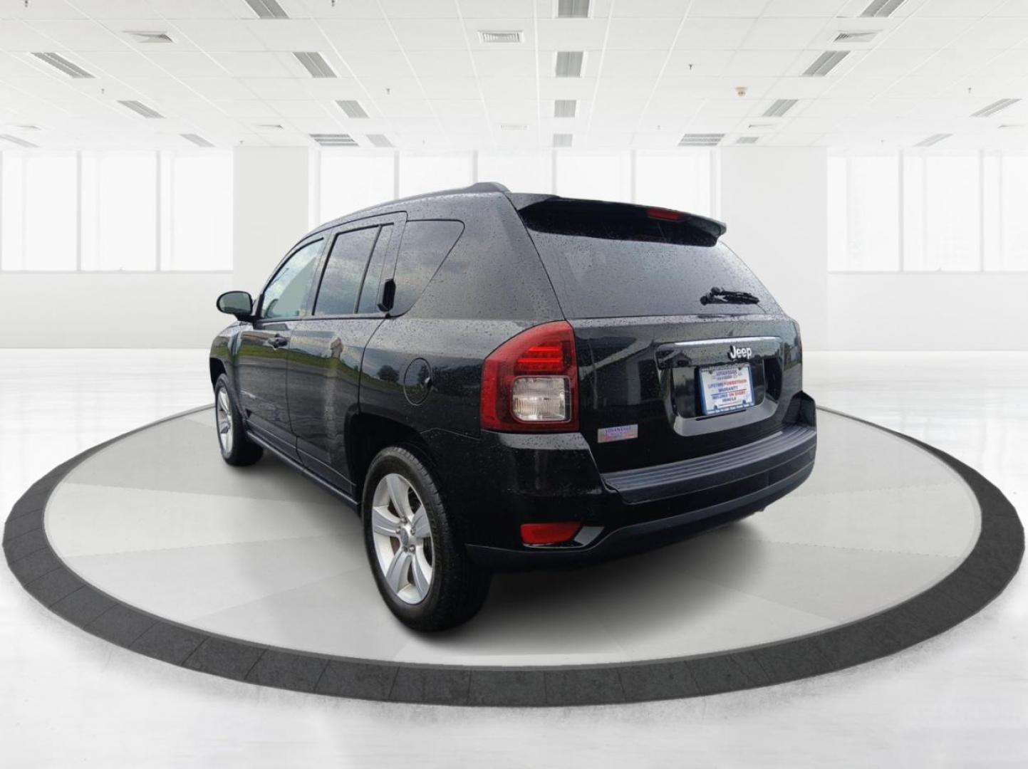 2016 Black Jeep Compass (1C4NJCBA6GD) with an 2.0L L4 DOHC 16V engine, located at 1184 Kauffman Ave, Fairborn, OH, 45324, (937) 908-9800, 39.807072, -84.030914 - Photo#4