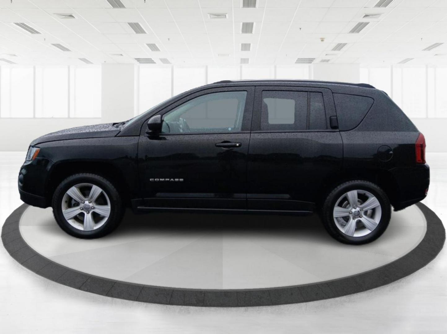 2016 Black Jeep Compass (1C4NJCBA6GD) with an 2.0L L4 DOHC 16V engine, located at 1184 Kauffman Ave, Fairborn, OH, 45324, (937) 908-9800, 39.807072, -84.030914 - Photo#5