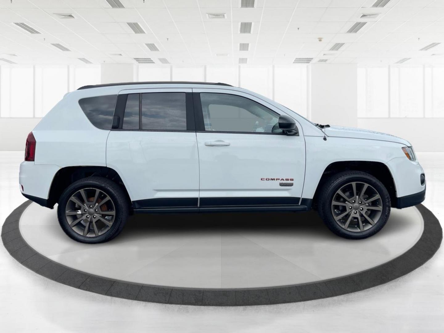 2016 White Jeep Compass Sport FWD (1C4NJCBBXGD) with an 2.4L L4 DOHC 16V engine, located at 4508 South Dixie Dr, Moraine, OH, 45439, (937) 908-9800, 39.689976, -84.218452 - Photo#1