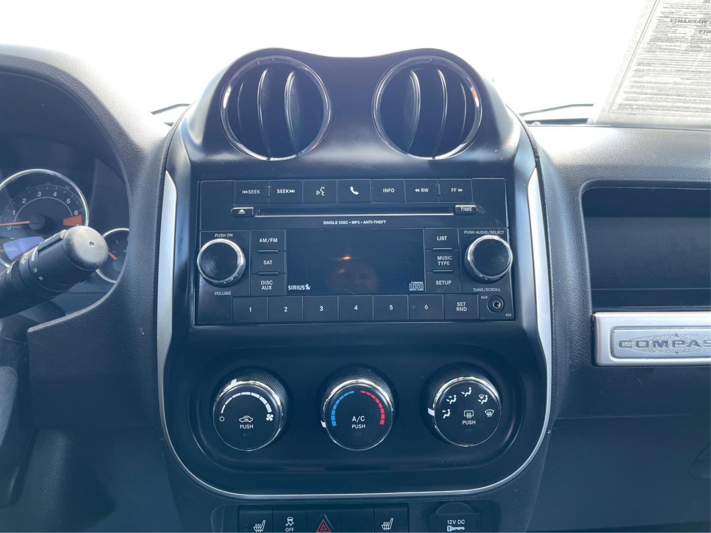 2016 Red Jeep Compass Latitude 4WD (1C4NJDEB3GD) with an 2.4L L4 DOHC 16V engine, 6-Speed Automatic transmission, located at 1230 East Main St, Xenia, OH, 45385, (937) 908-9800, 39.688026, -83.910172 - Photo#12