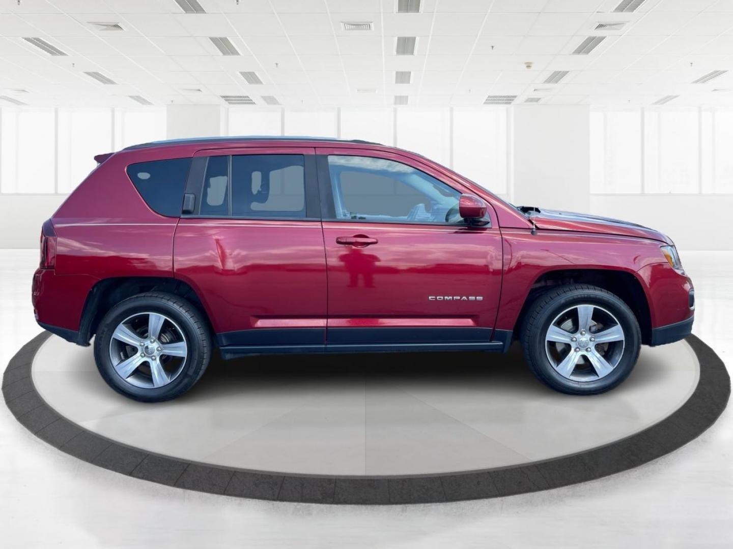 2016 Red Jeep Compass Latitude 4WD (1C4NJDEB3GD) with an 2.4L L4 DOHC 16V engine, 6-Speed Automatic transmission, located at 1230 East Main St, Xenia, OH, 45385, (937) 908-9800, 39.688026, -83.910172 - Photo#1